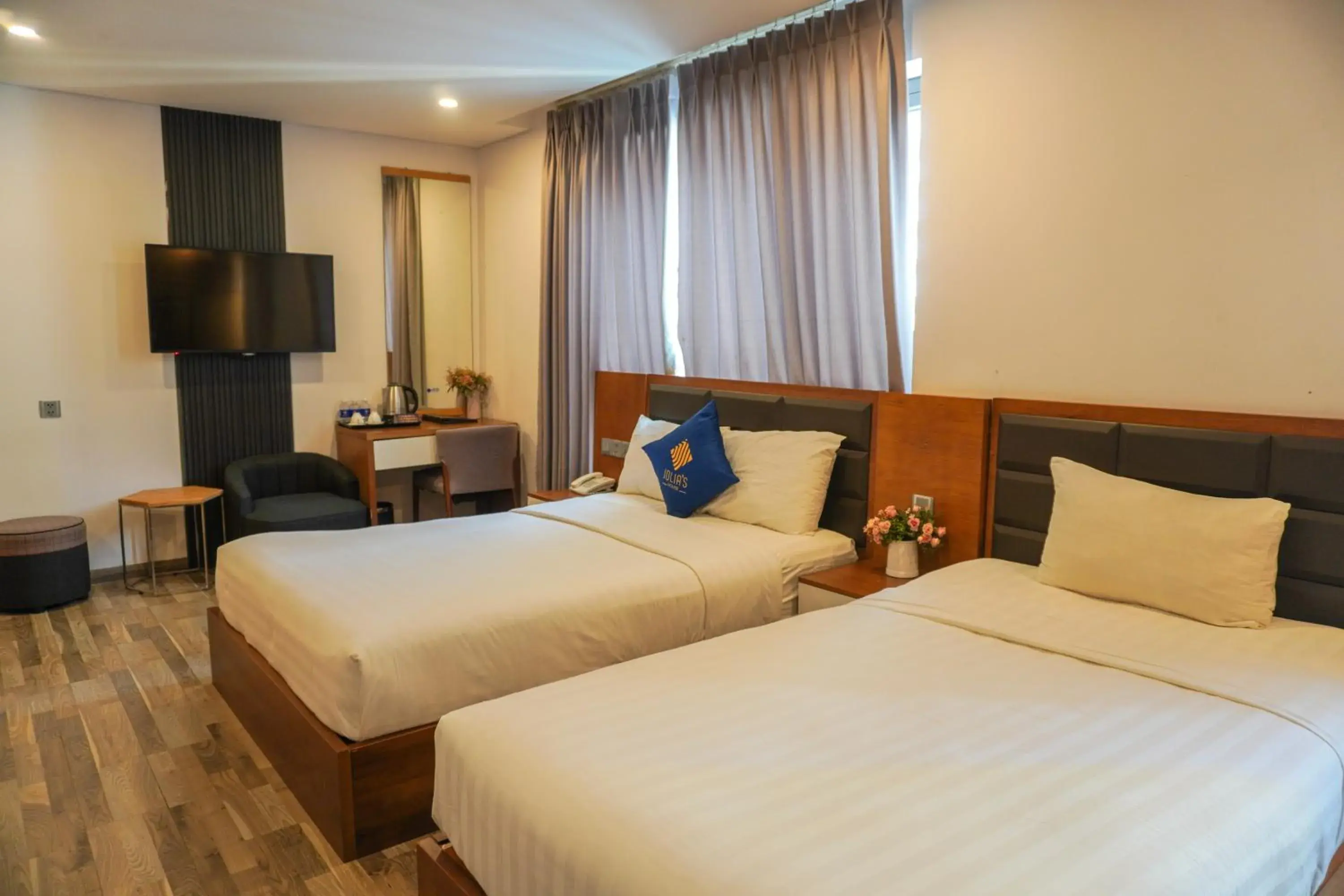 Deluxe Triple Room with City View in Jolia Hotel Danang Beach Deluxe Triple Room with City View in Jolia Hotel Danang Beach