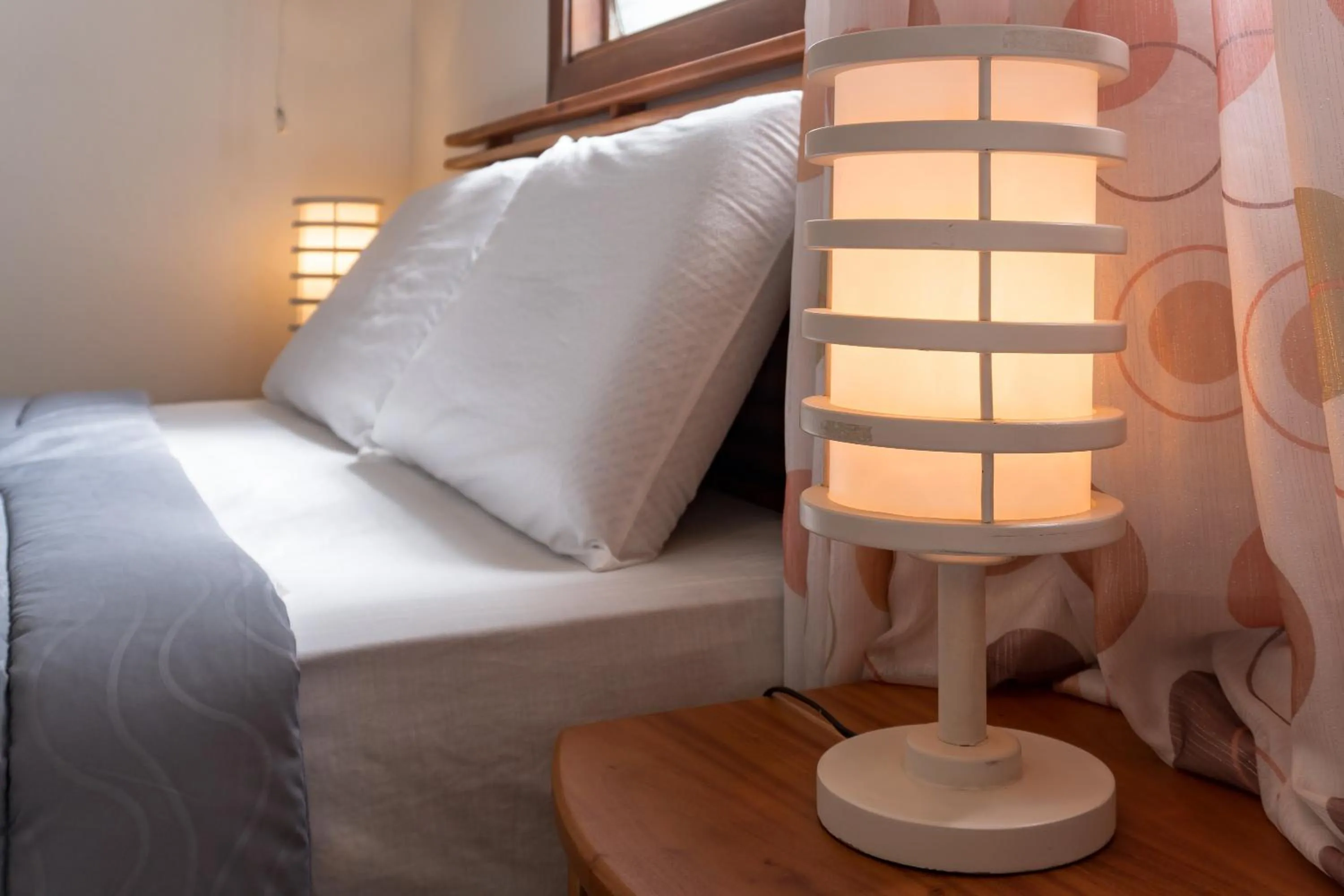 Bed in Quo Vadis Dive Resort