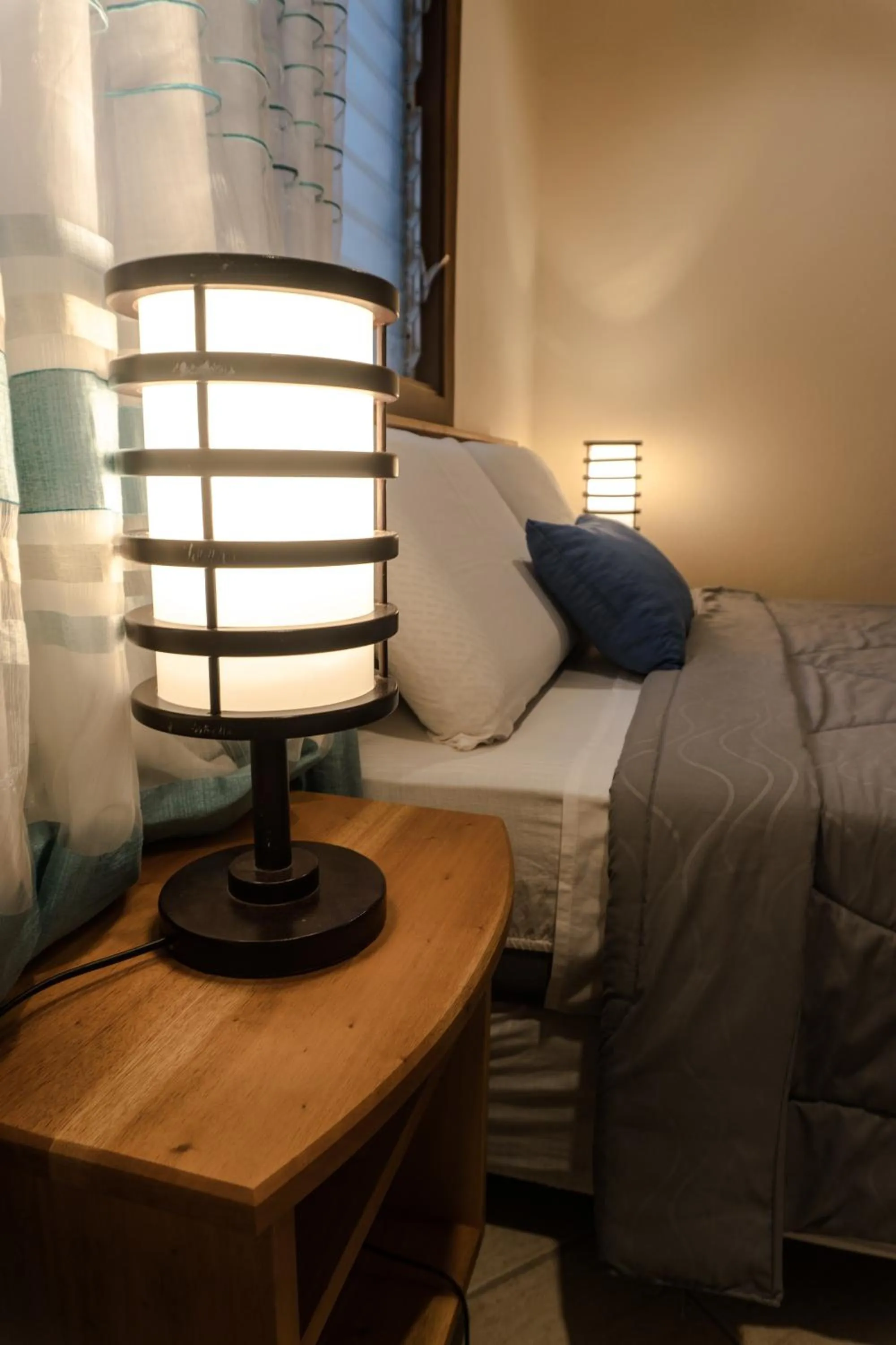 Bed in Quo Vadis Dive Resort