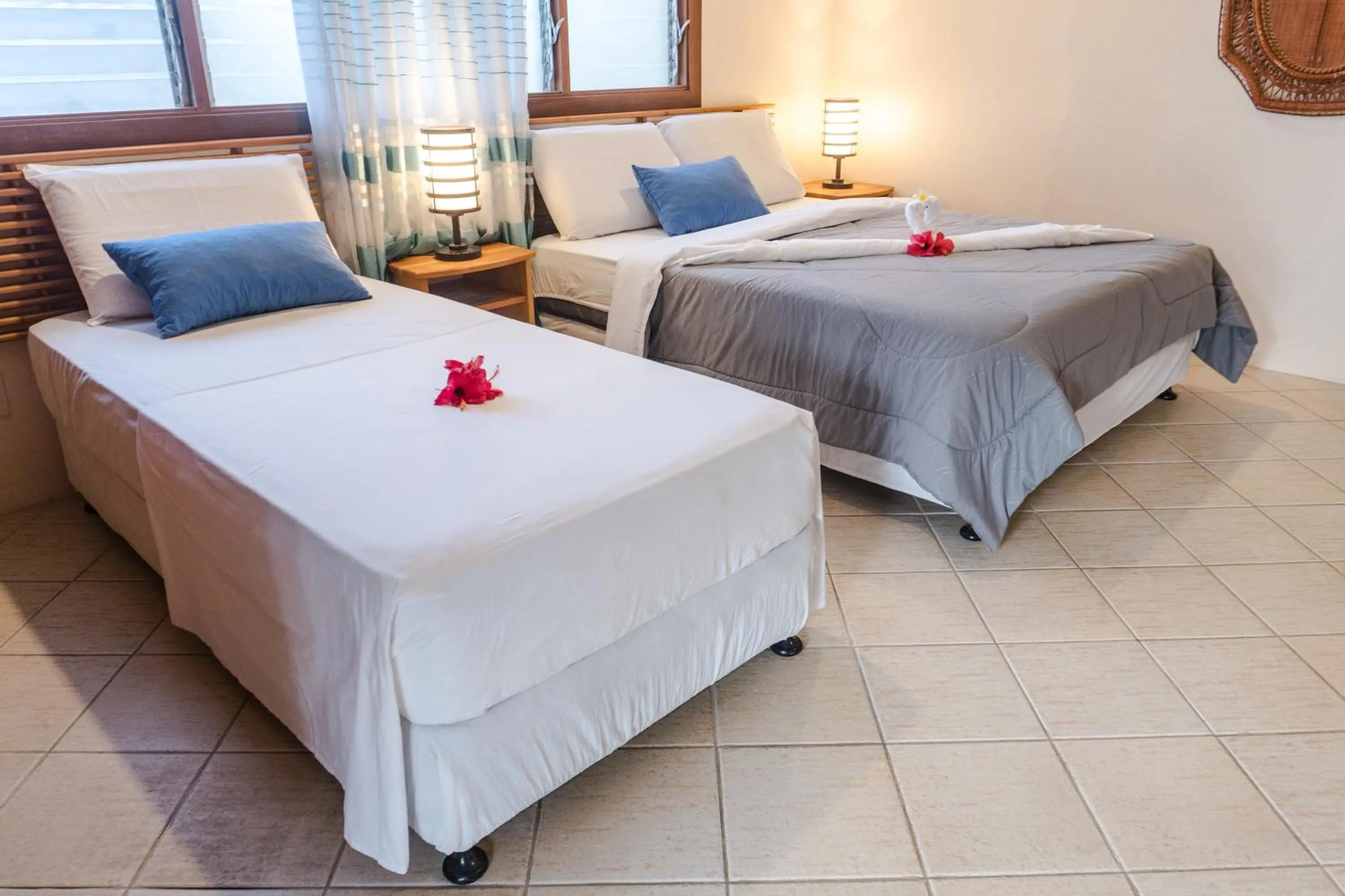Bed in Quo Vadis Dive Resort