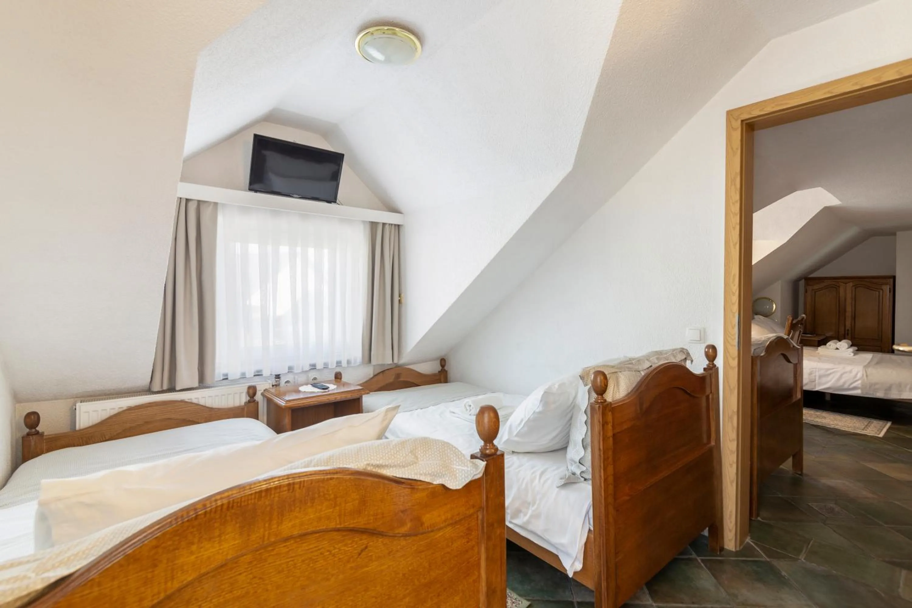 Bed in Jagodic Garni Hotel