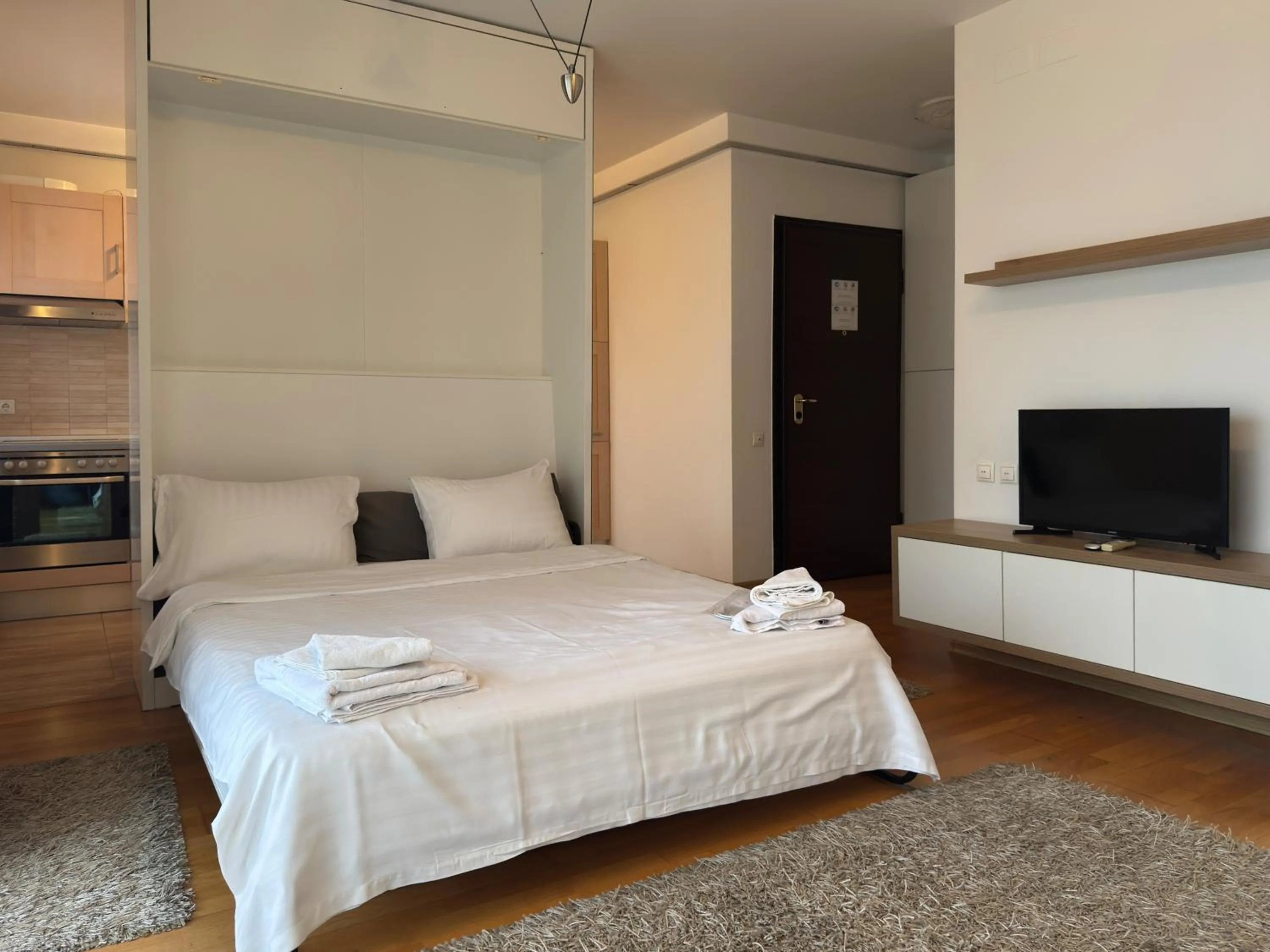 Bed in Monte Carlo Palace Suites