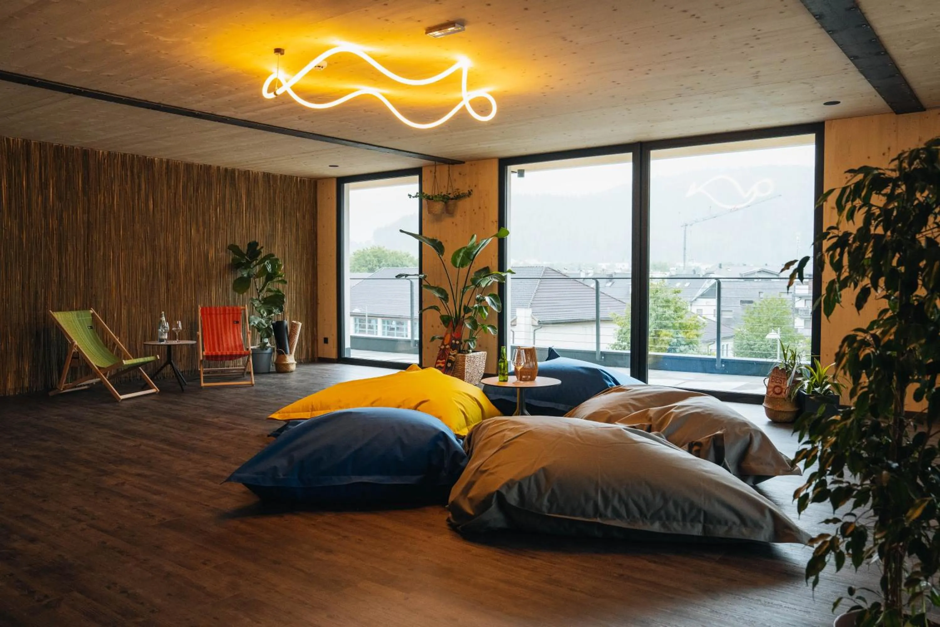 Seating area, Bed in Hotel Wochtla Buam Aktivhotel am Kronplatz mit Sauna