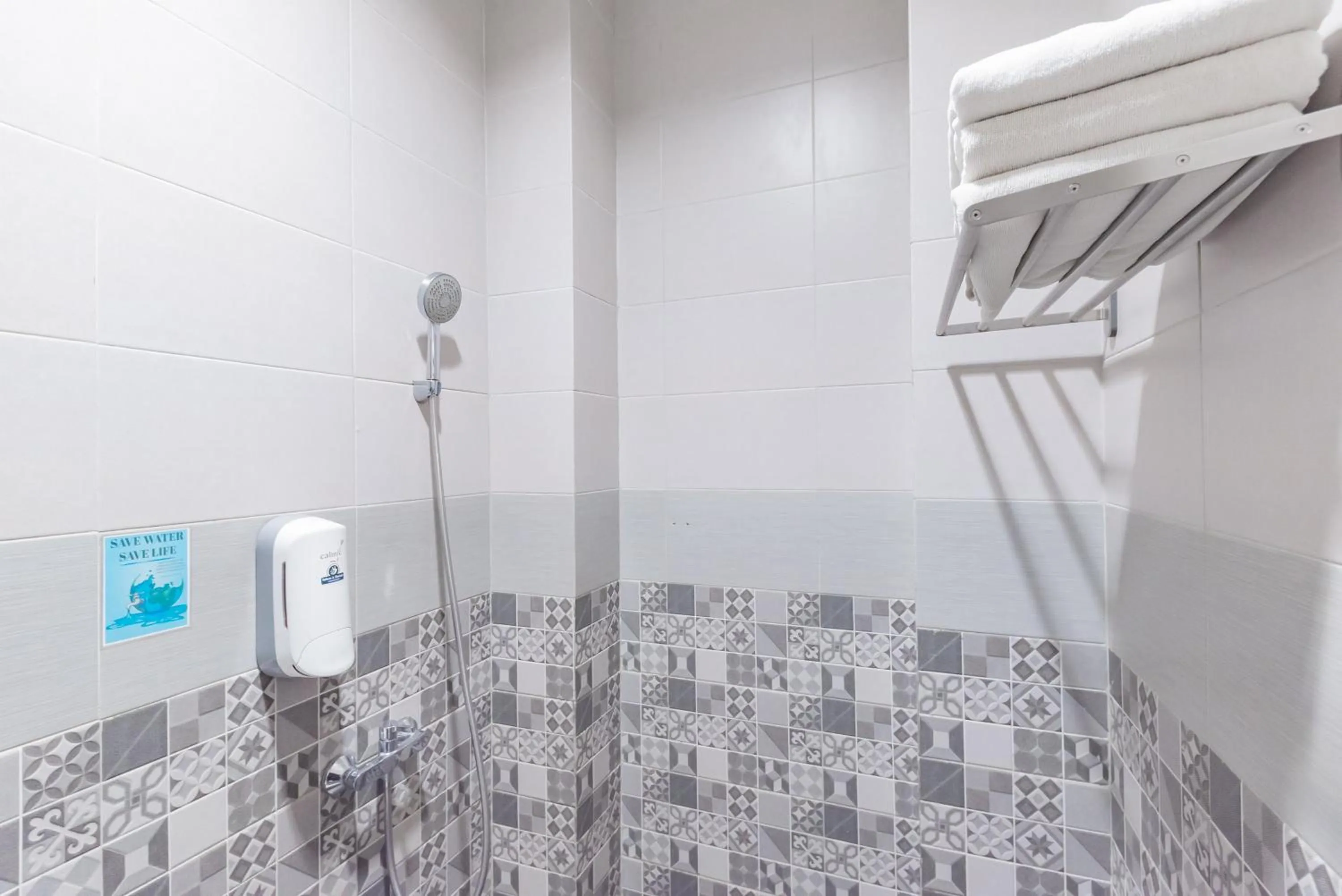 Bathroom in Urbanview Darmo Residence Bandung