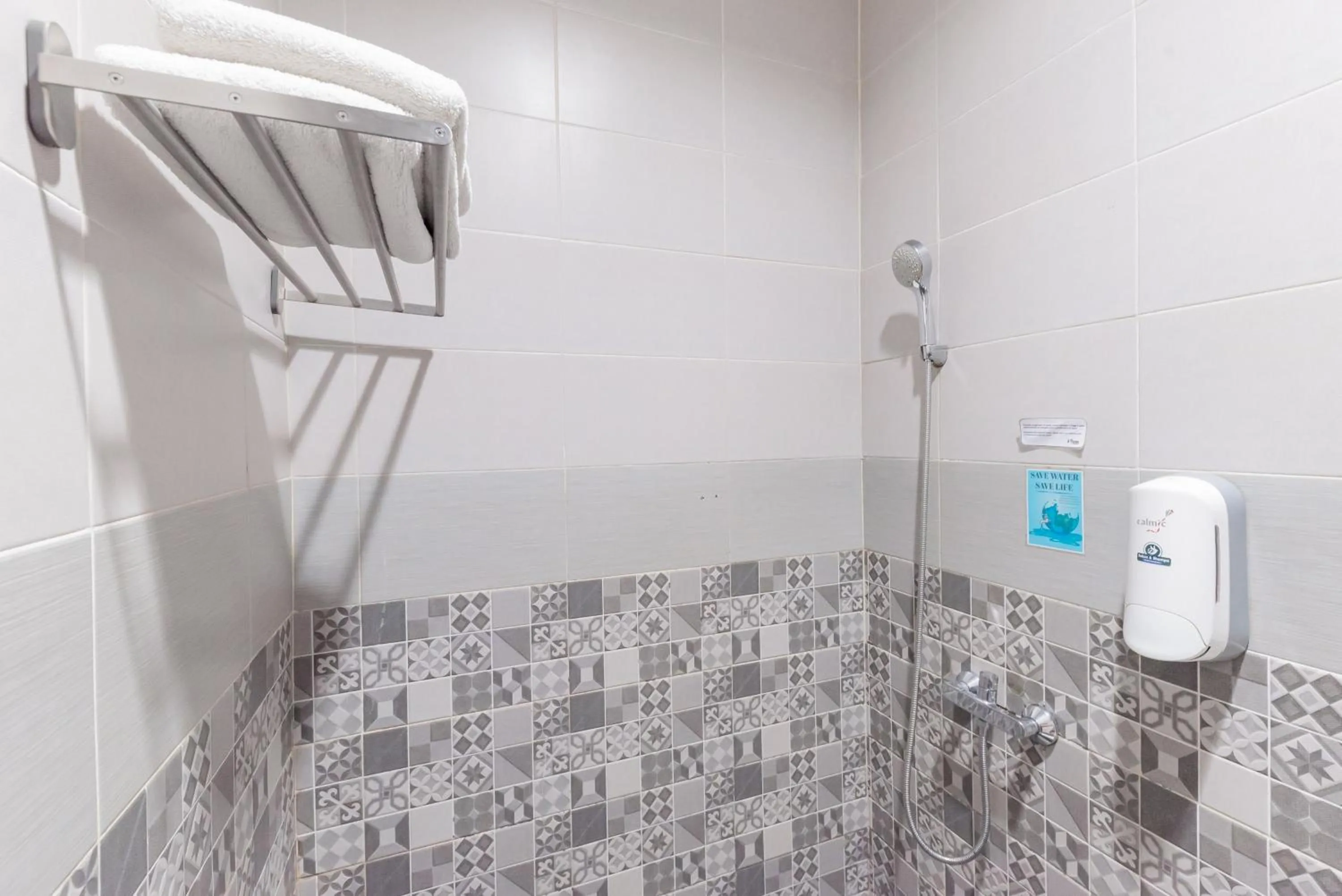 Bathroom in Urbanview Darmo Residence Bandung