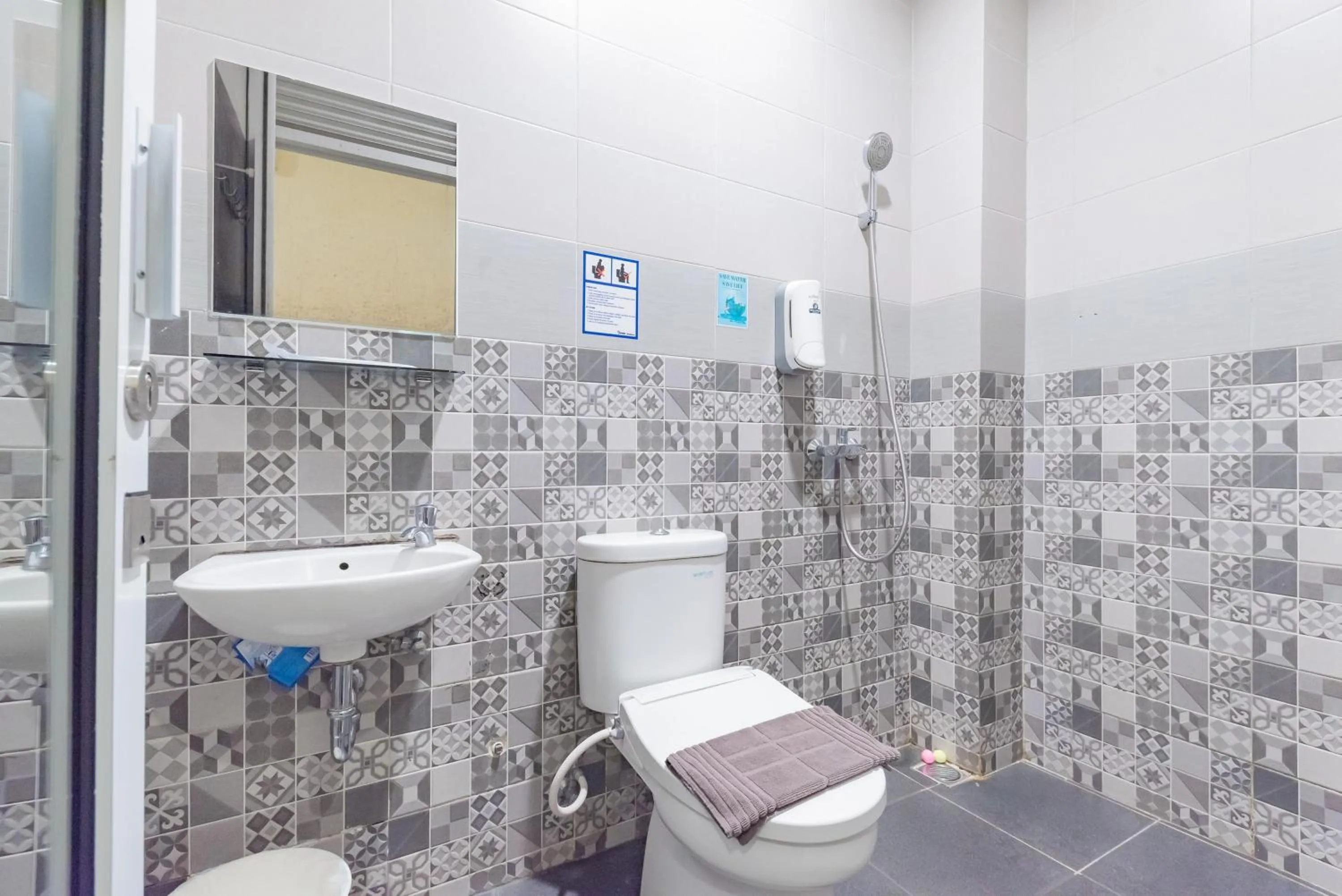 Bathroom in Urbanview Darmo Residence Bandung