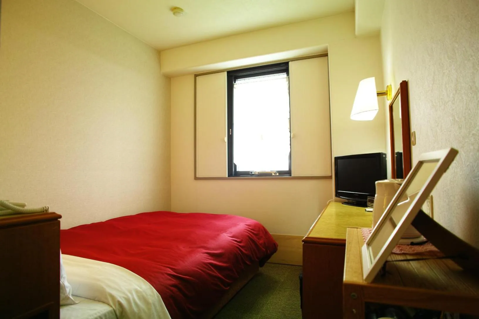 Bed in Tourist Hotel Hitachi