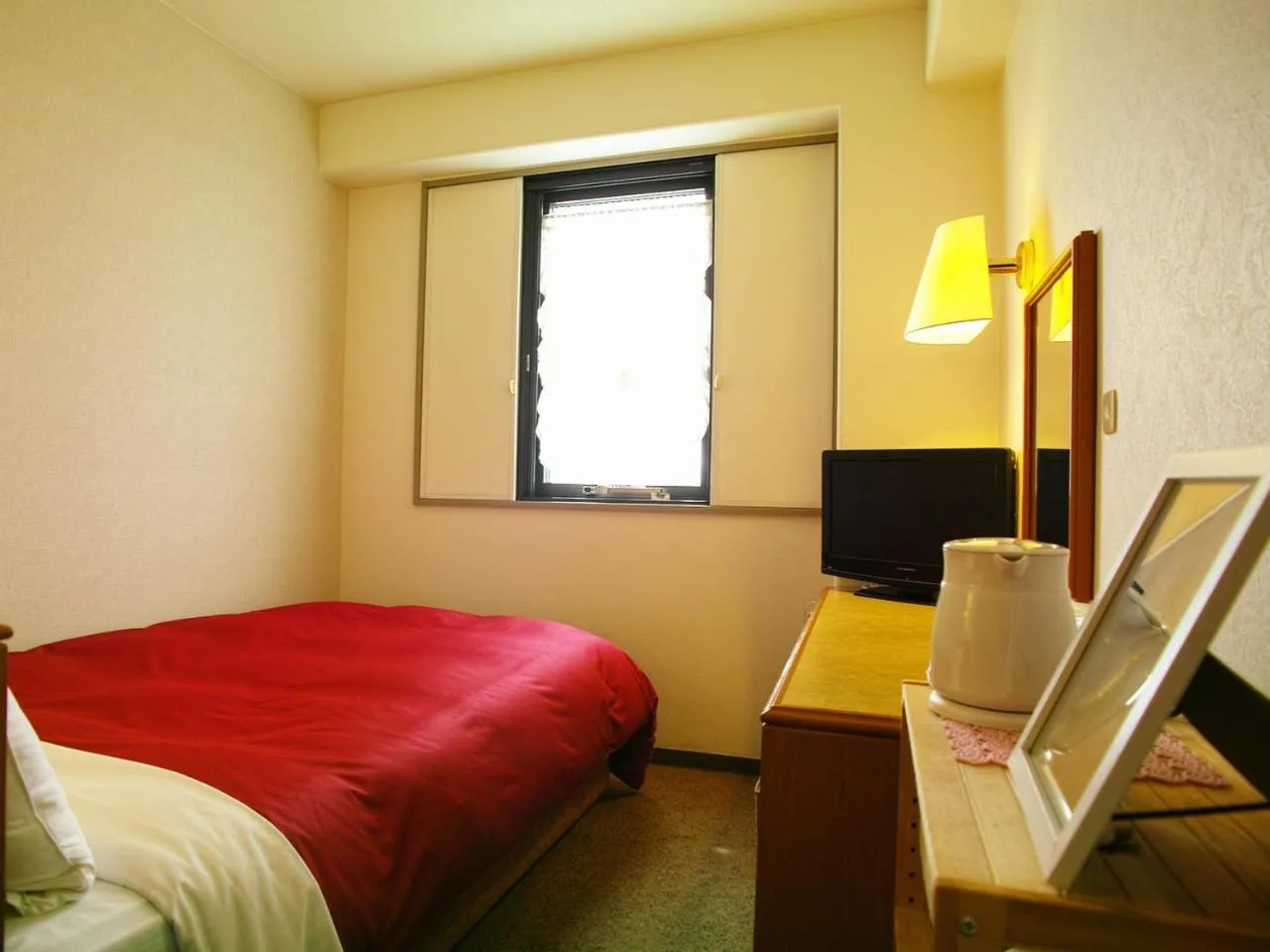 Bed in Tourist Hotel Hitachi