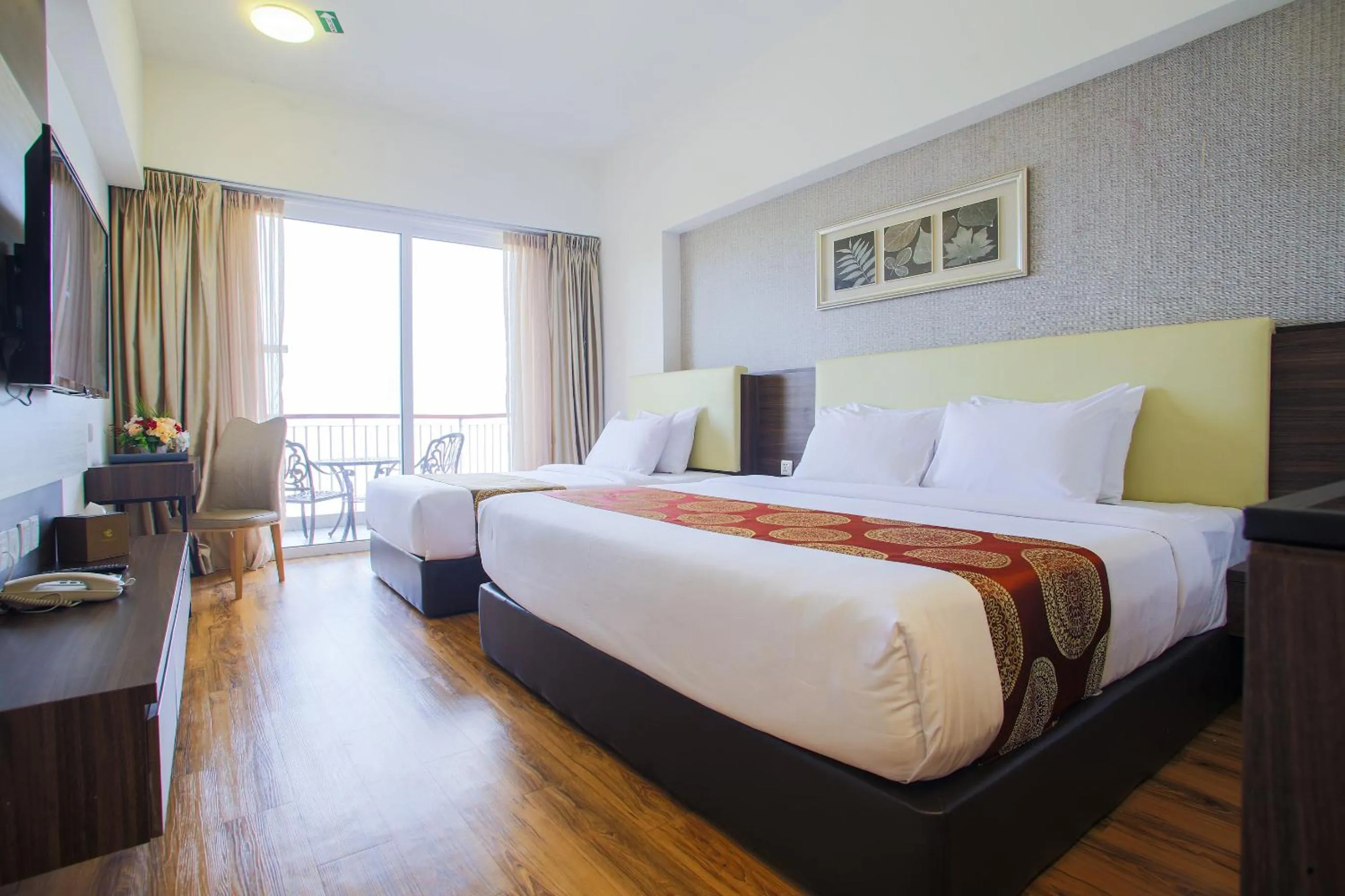 Bed in AMERALD RESORT HOTEL DESARU