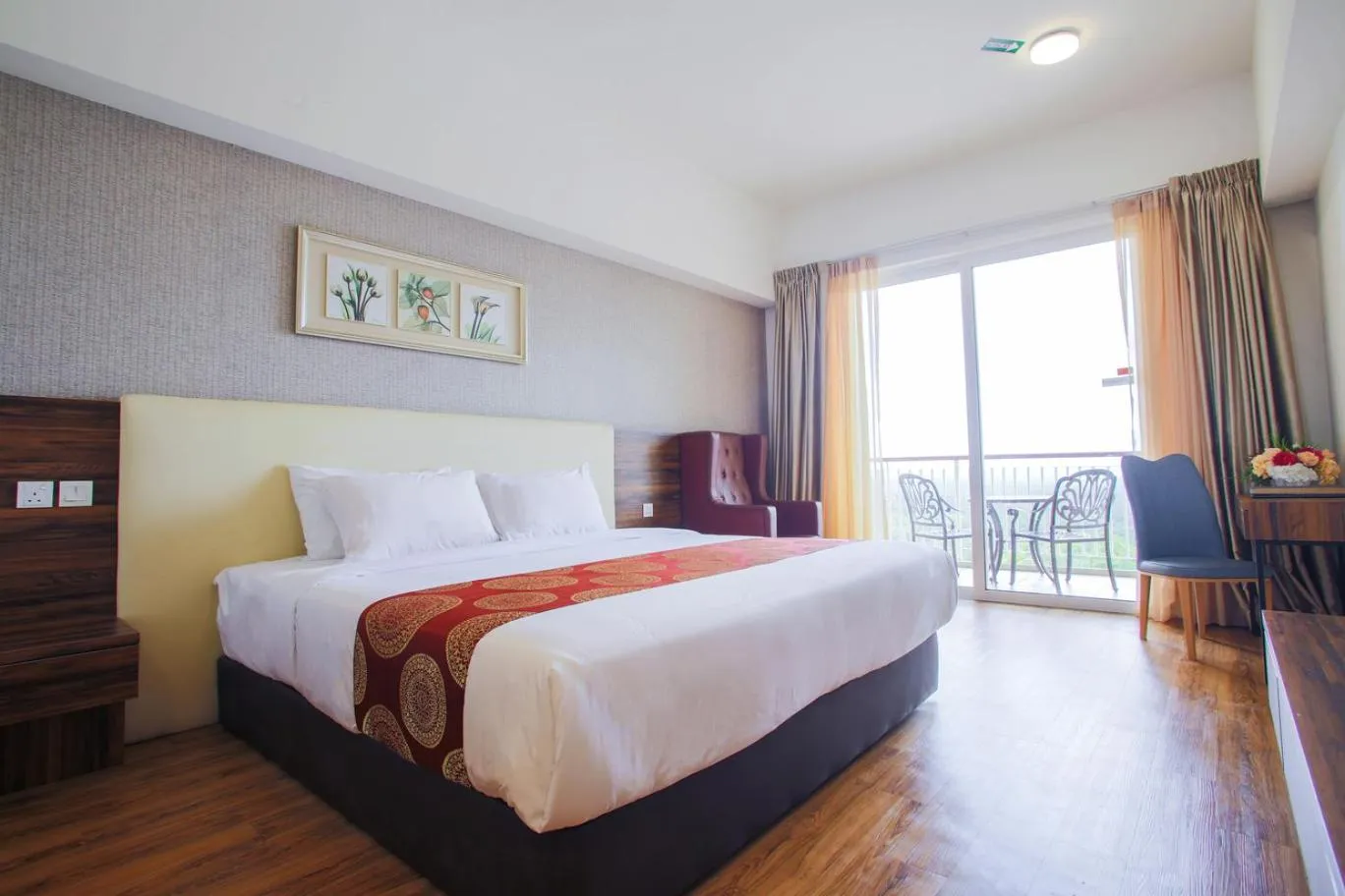 Bed in AMERALD RESORT HOTEL DESARU