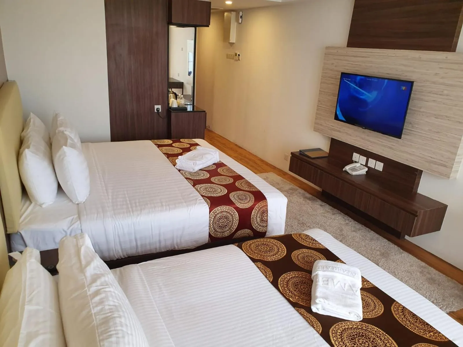 Bed in AMERALD RESORT HOTEL DESARU