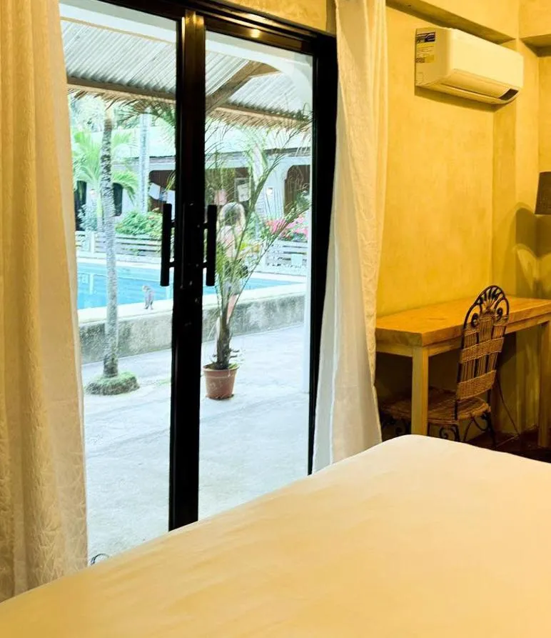 Bed in Charisma Beach Resort