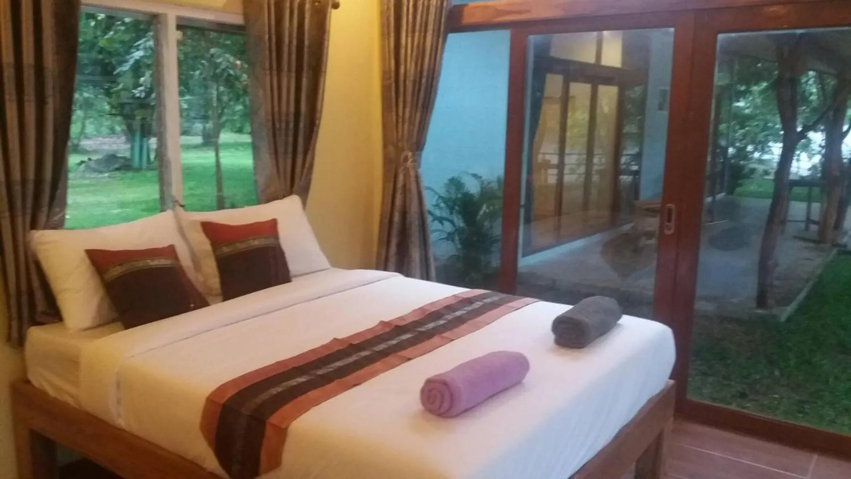 Bed in Kodaun River Kwai Resort