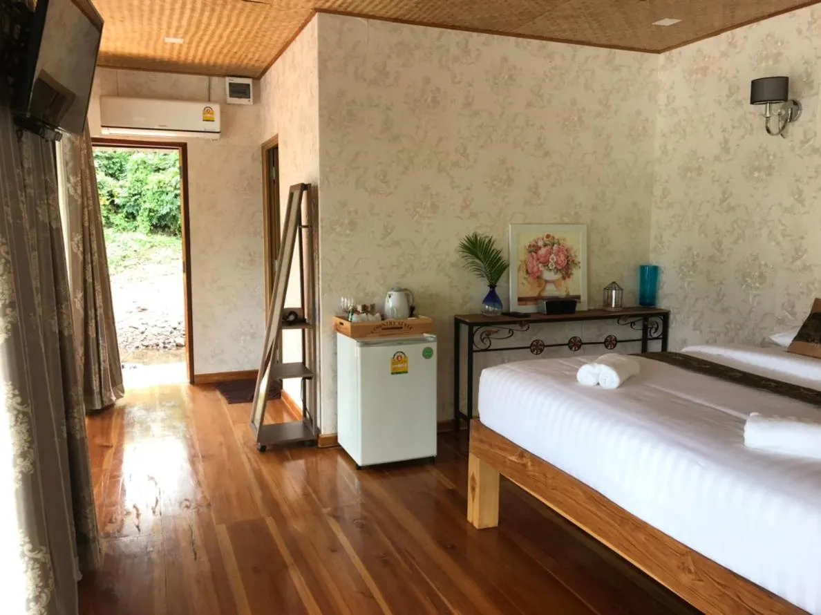 Bed in Kodaun River Kwai Resort