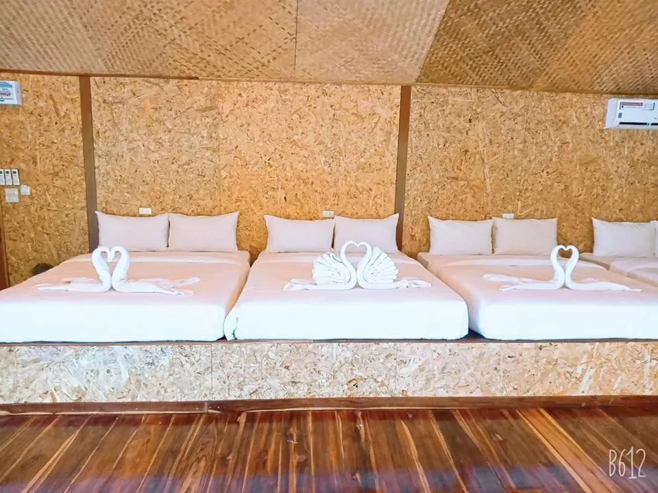 Bed in Kodaun River Kwai Resort