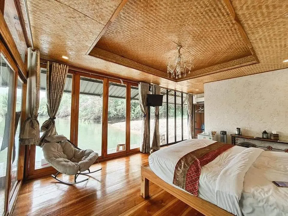 Bed in Kodaun River Kwai Resort