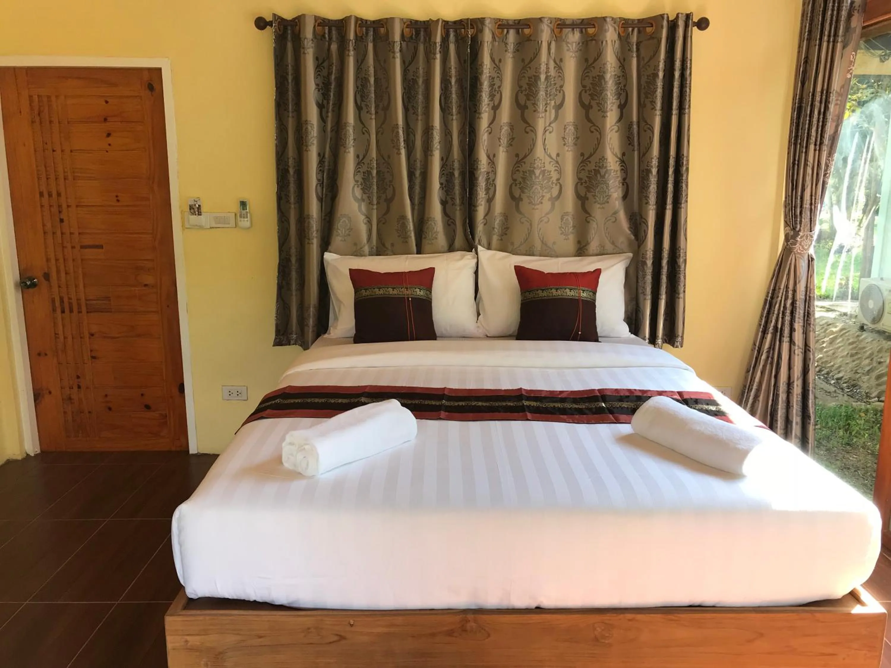 Bed in Kodaun River Kwai Resort