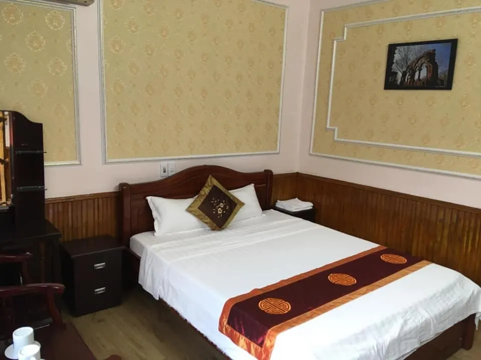 Photo of the whole room, Bed in Ngan Nga Bac Ha Hotel