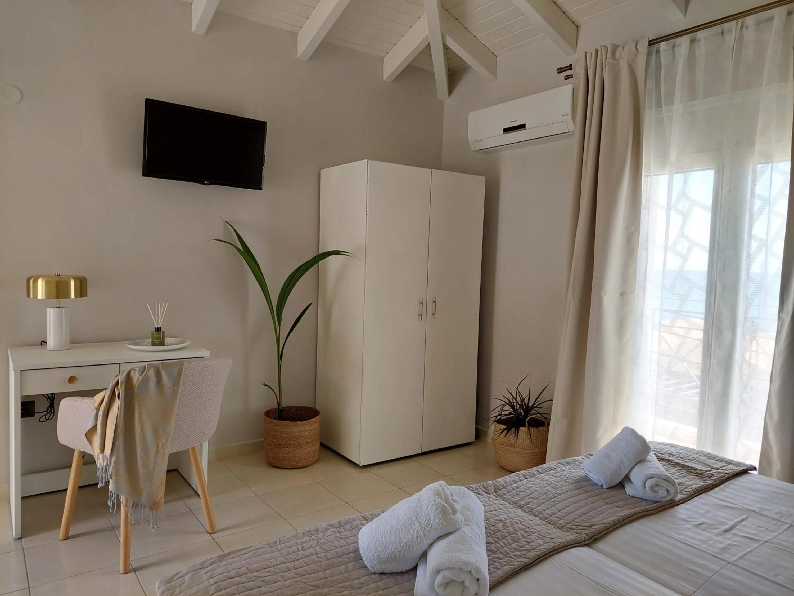 Bed in Socrates Apartments