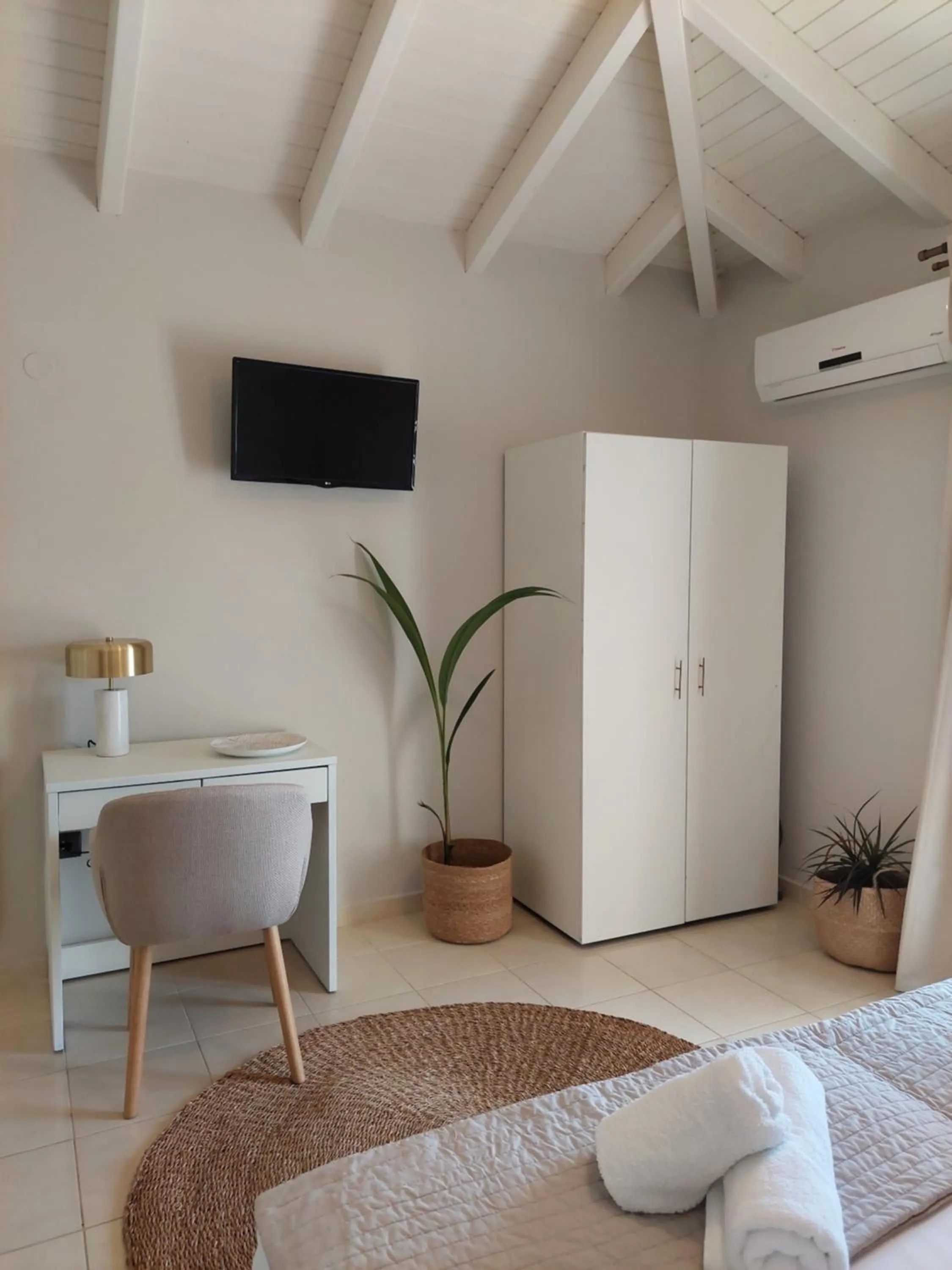 Bed in Socrates Apartments