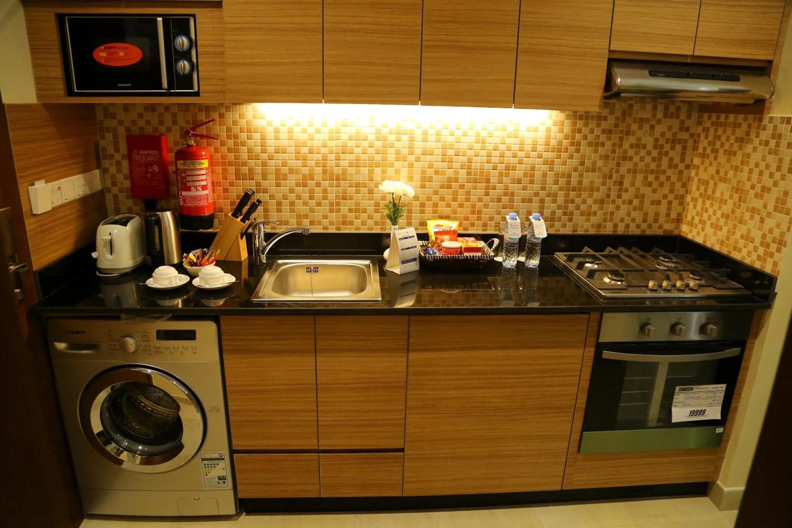 Kitchen or kitchenette in Tulip Al Barsha Hotel Apartment