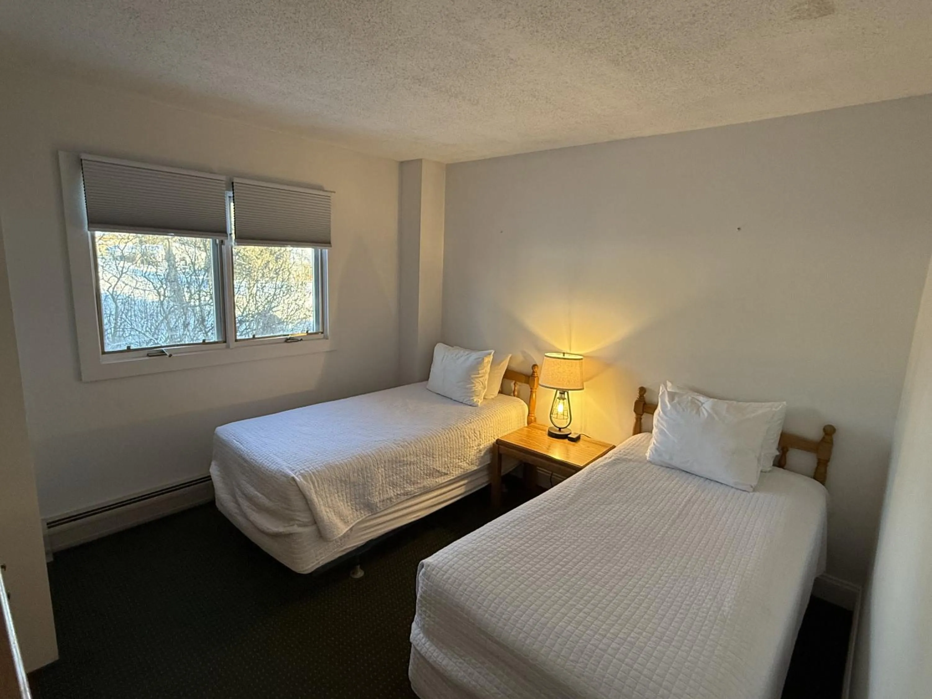 Bed in Stowe Motel & Snowdrift