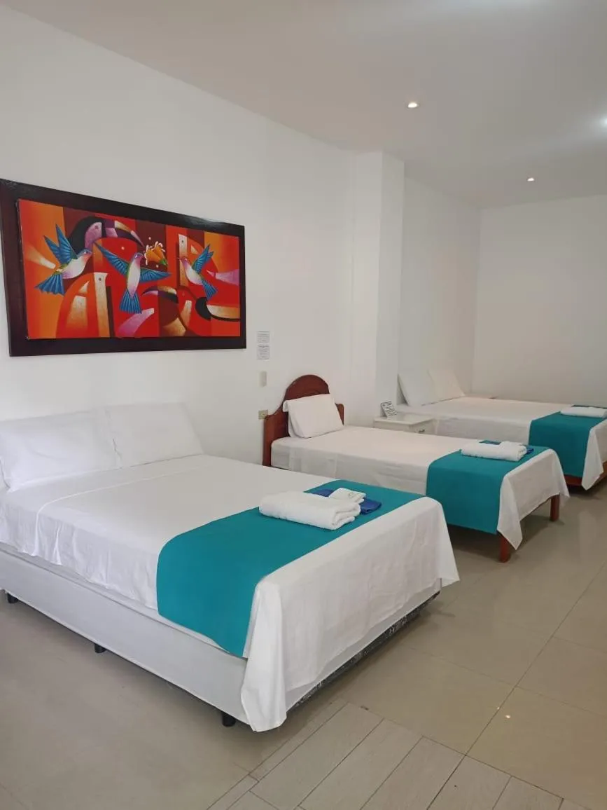 Bed in Galápagos Isabela Hotel Loja