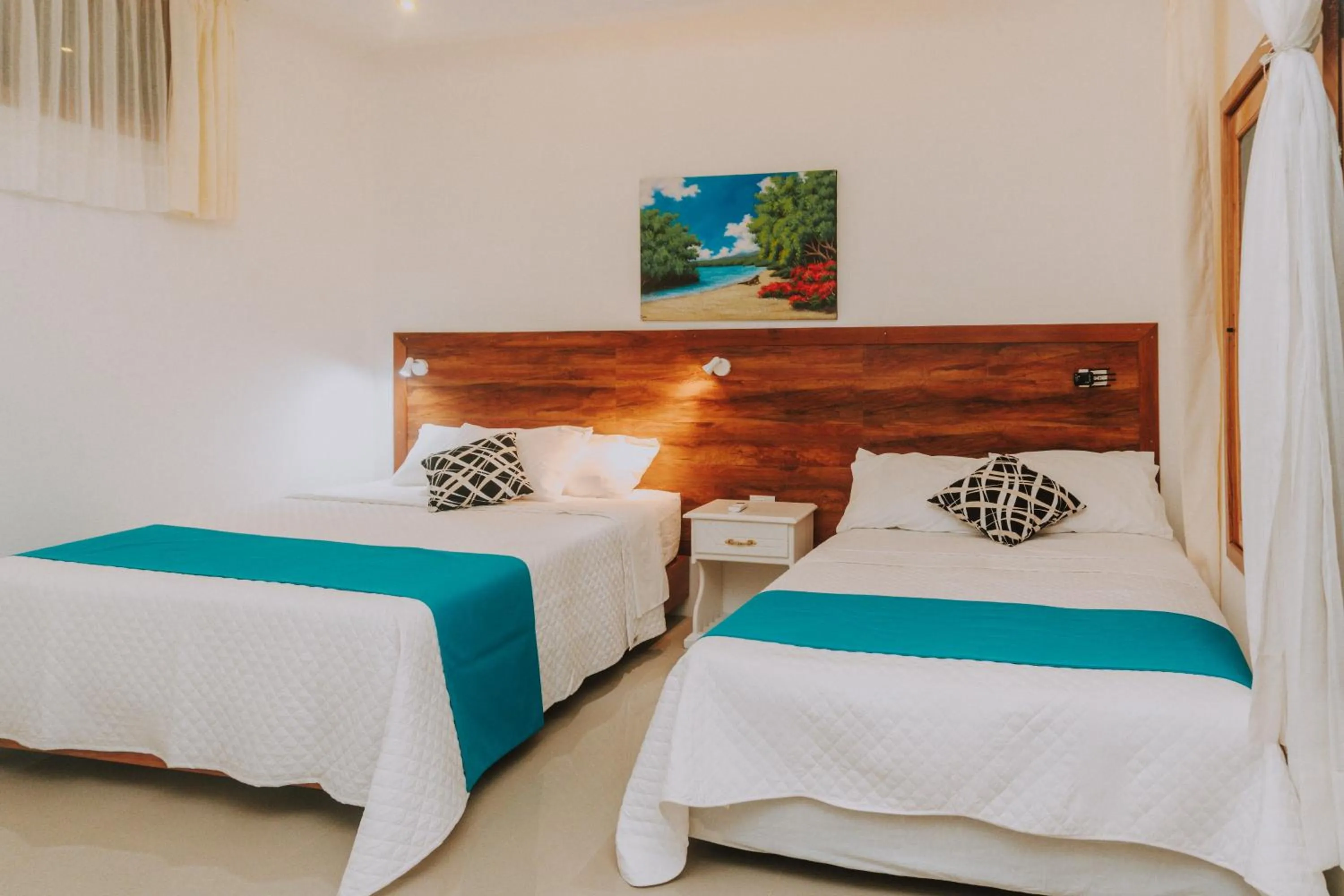 Photo of the whole room, Bed in Galápagos Isabela Hotel Loja