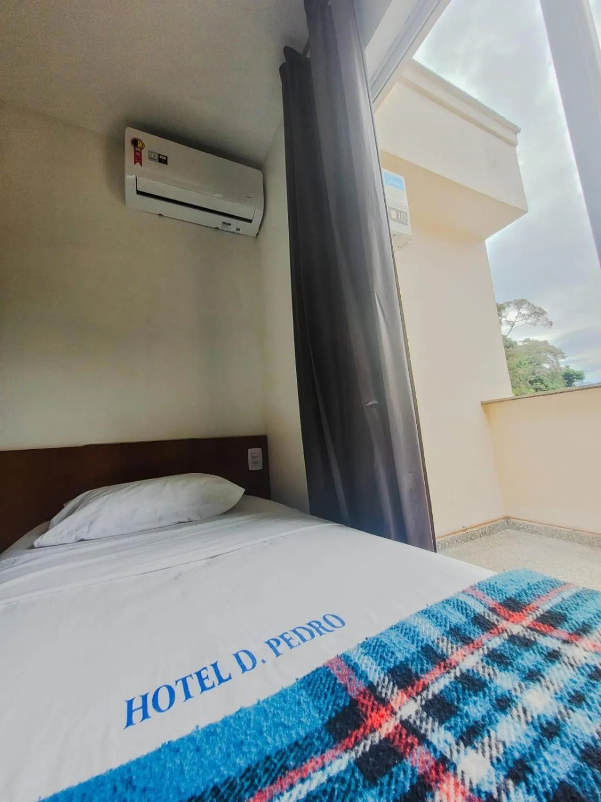 Bed in Dom Pedro Hotel