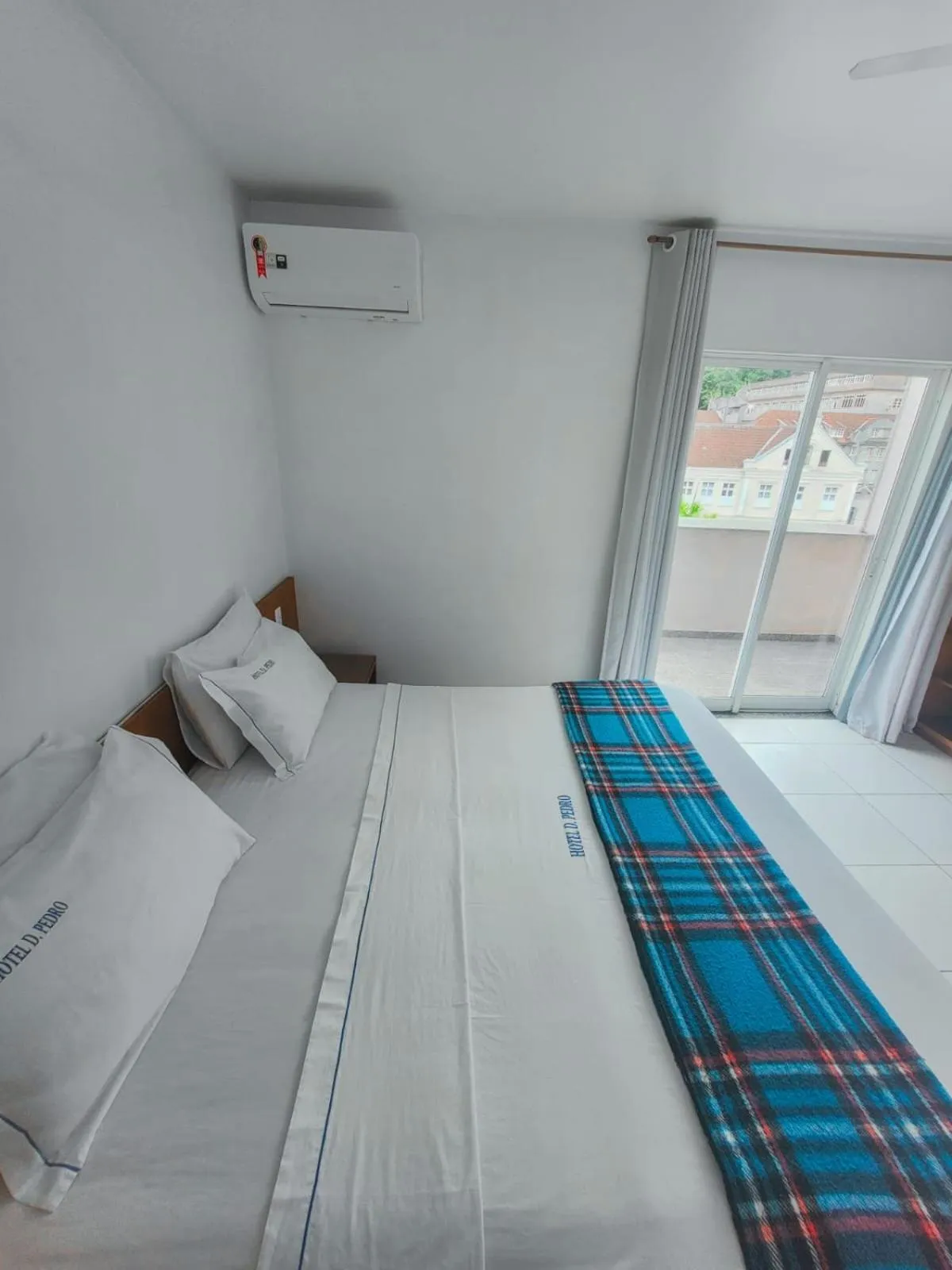 Bed in Dom Pedro Hotel