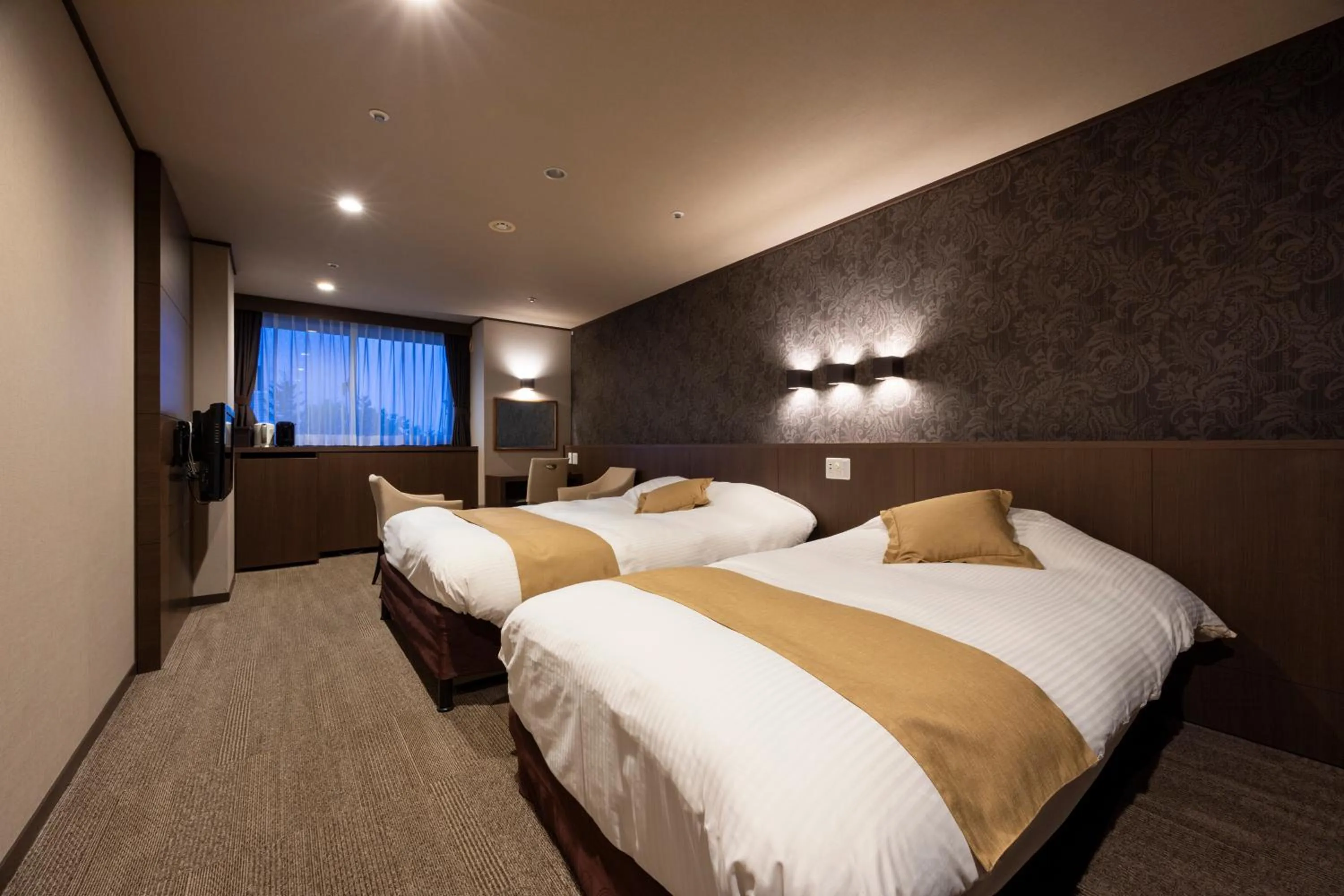 Bed in Hotel Kanronomori