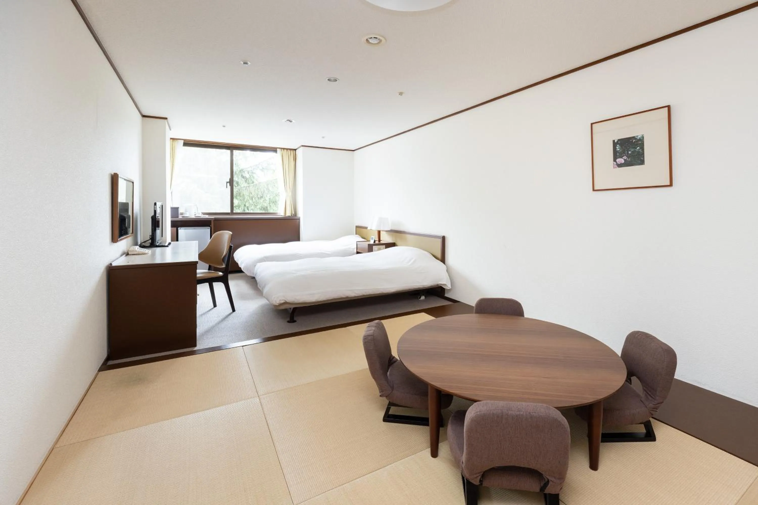 Bed in Hotel Kanronomori