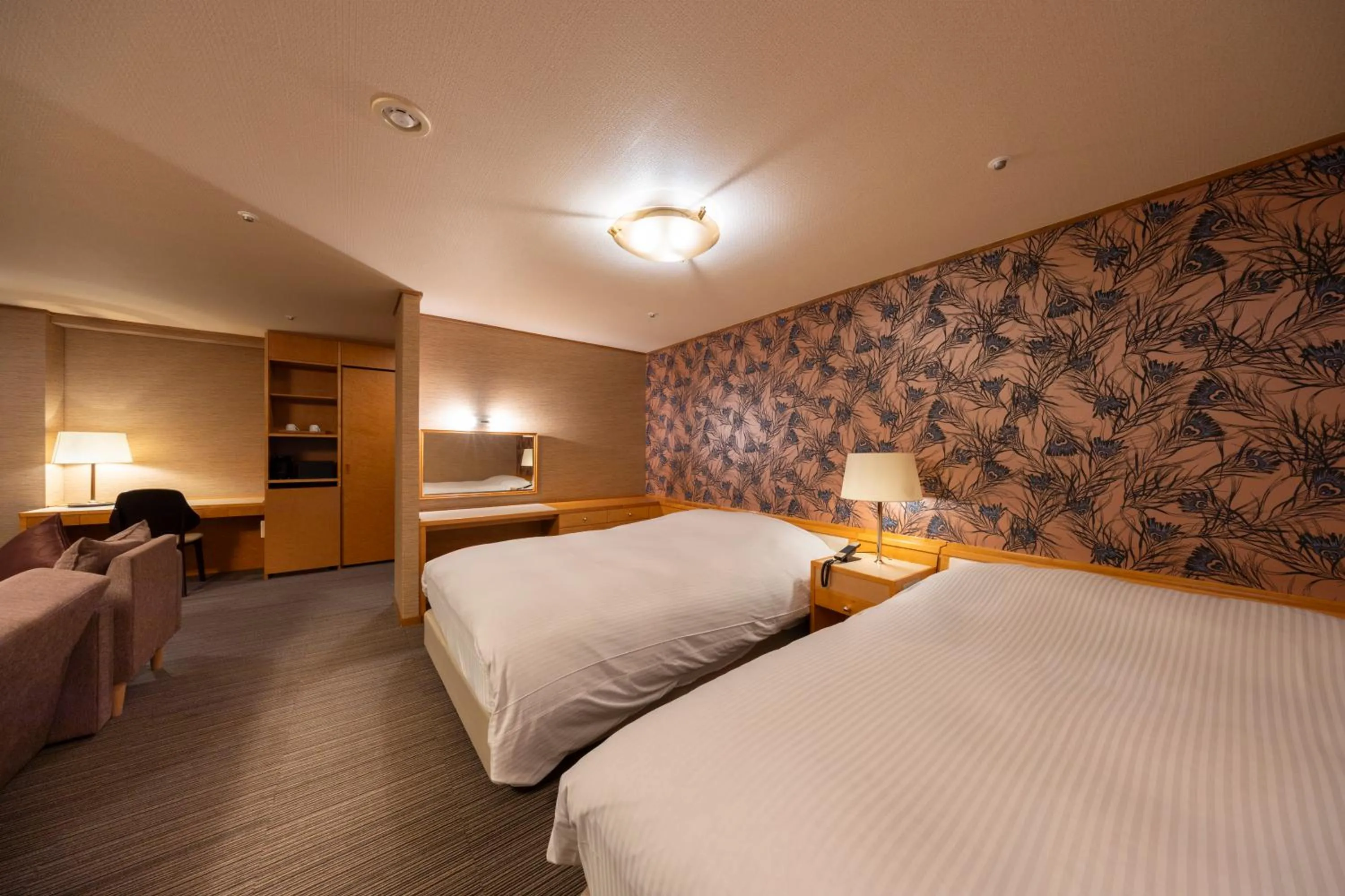 Bed in Hotel Kanronomori