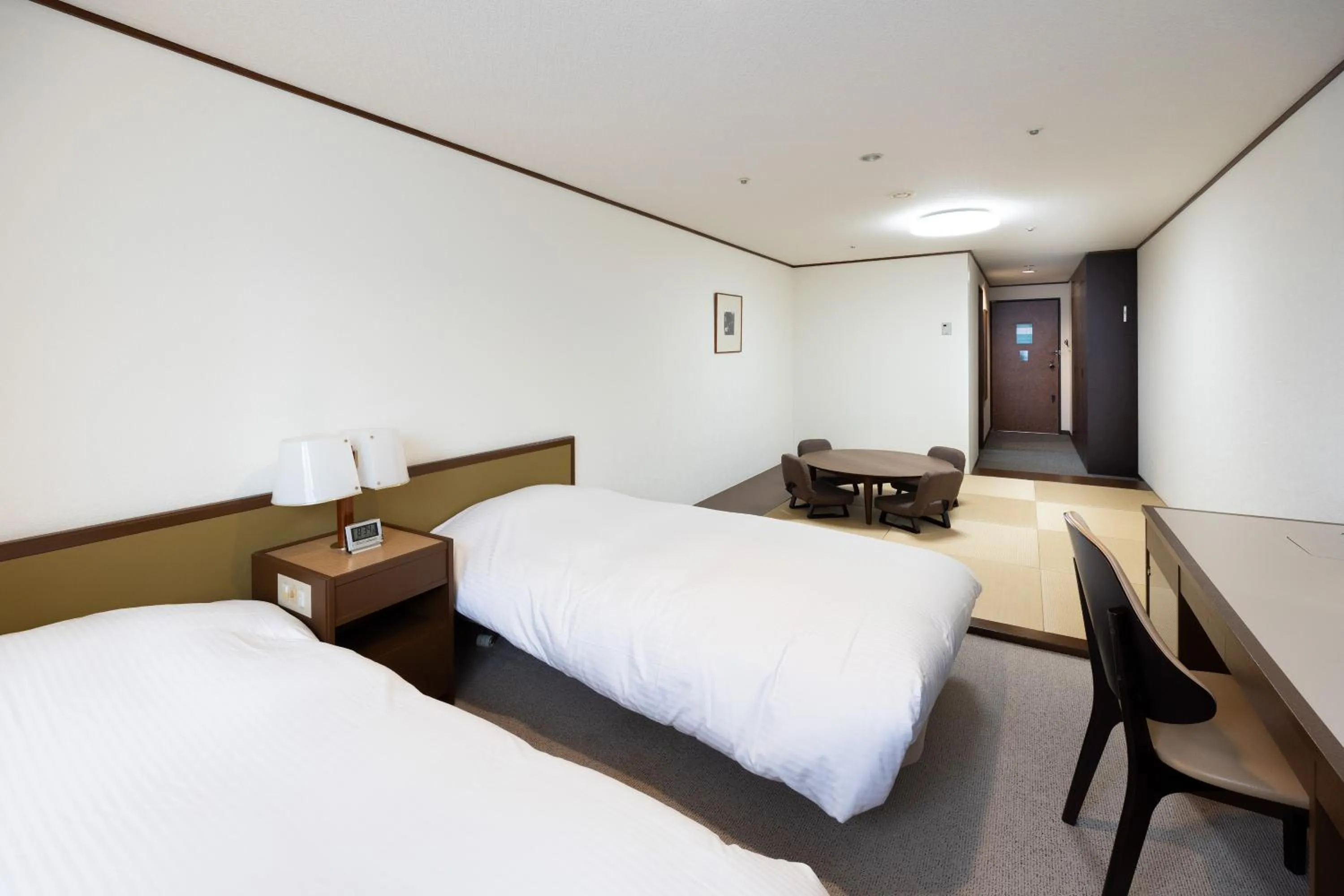 Bed in Hotel Kanronomori