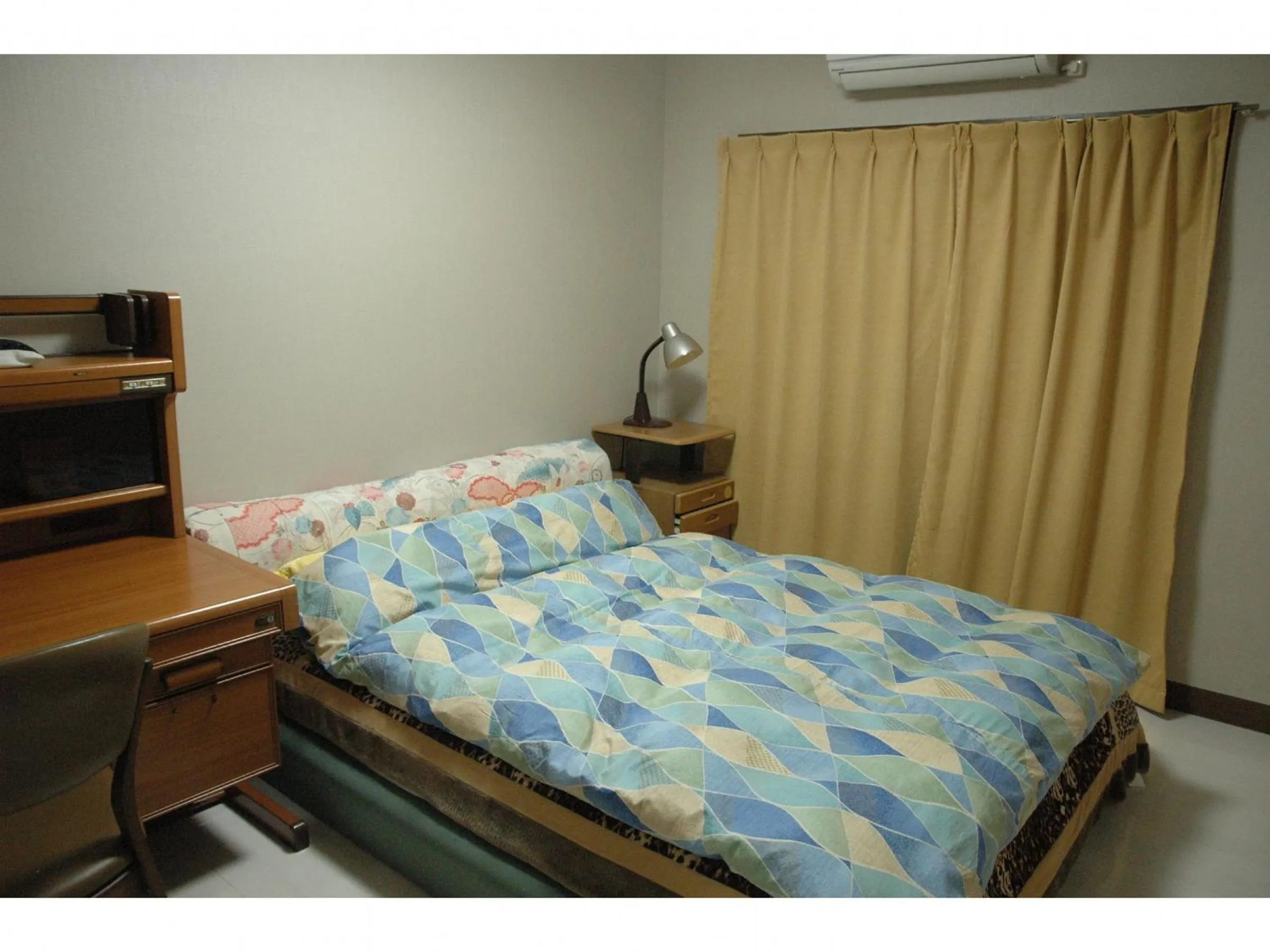 Bed in Oyama Guesthouse Kyoto