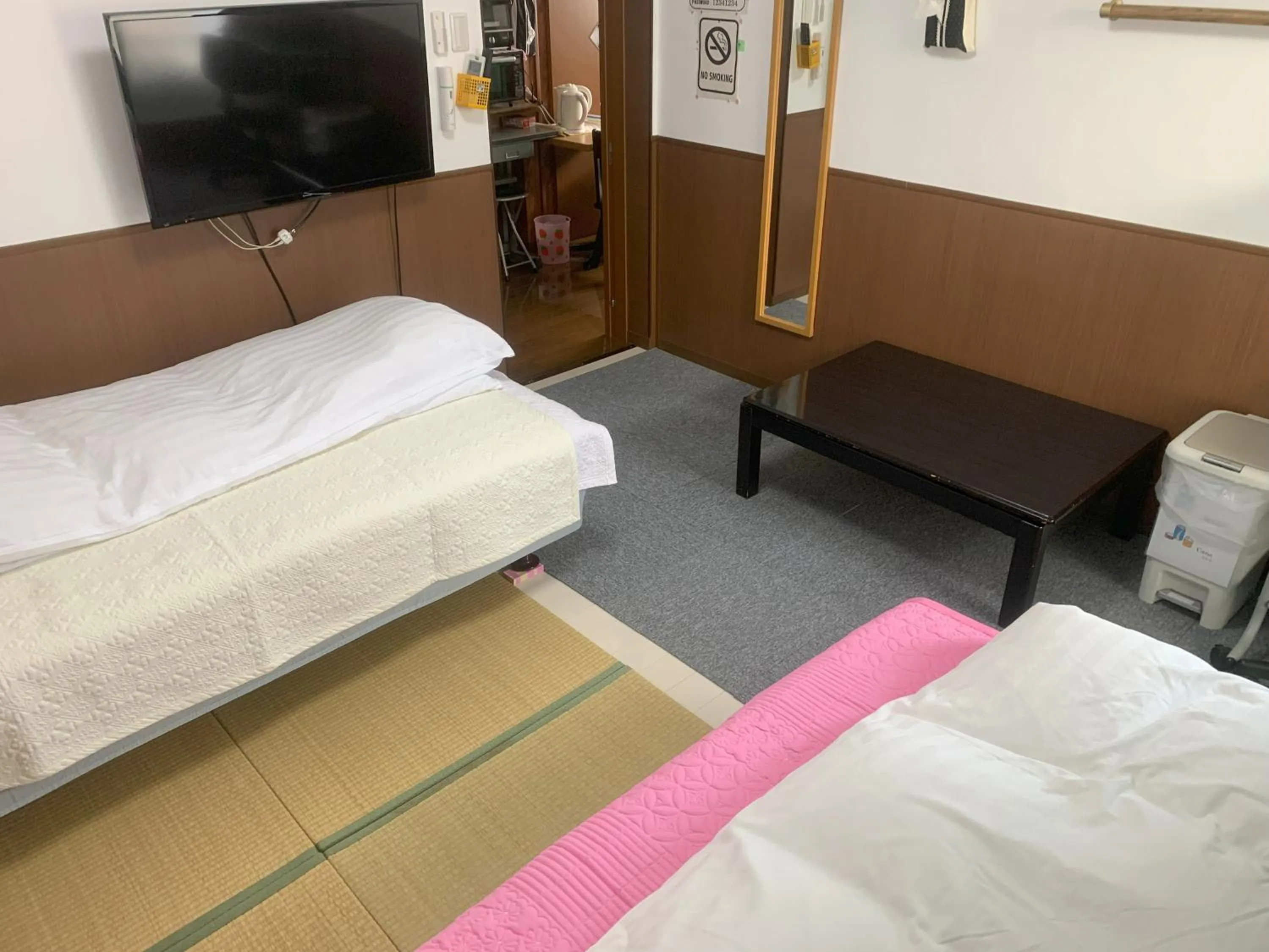 Bed in Oyama Guesthouse Kyoto