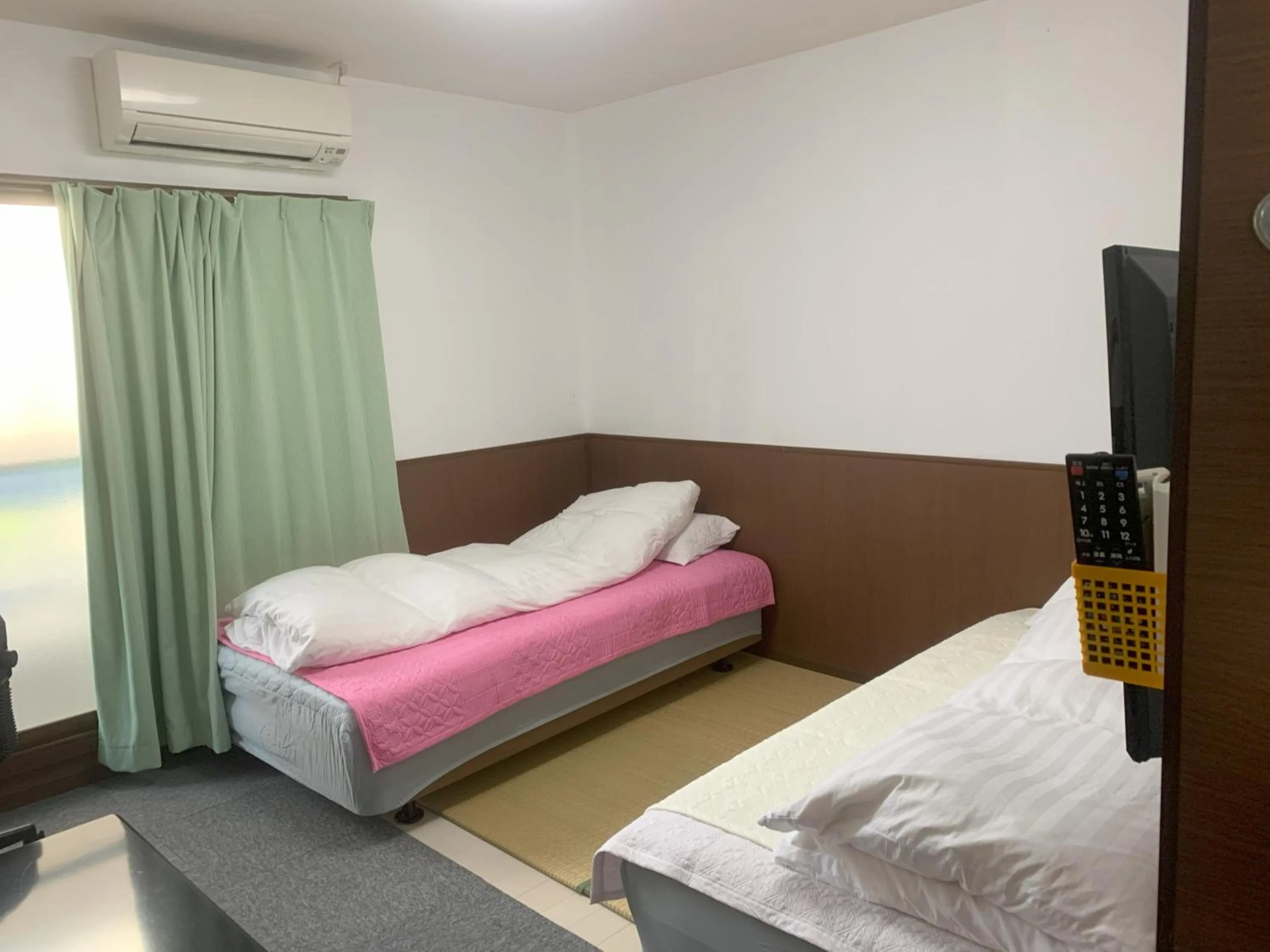 Bed in Oyama Guesthouse Kyoto