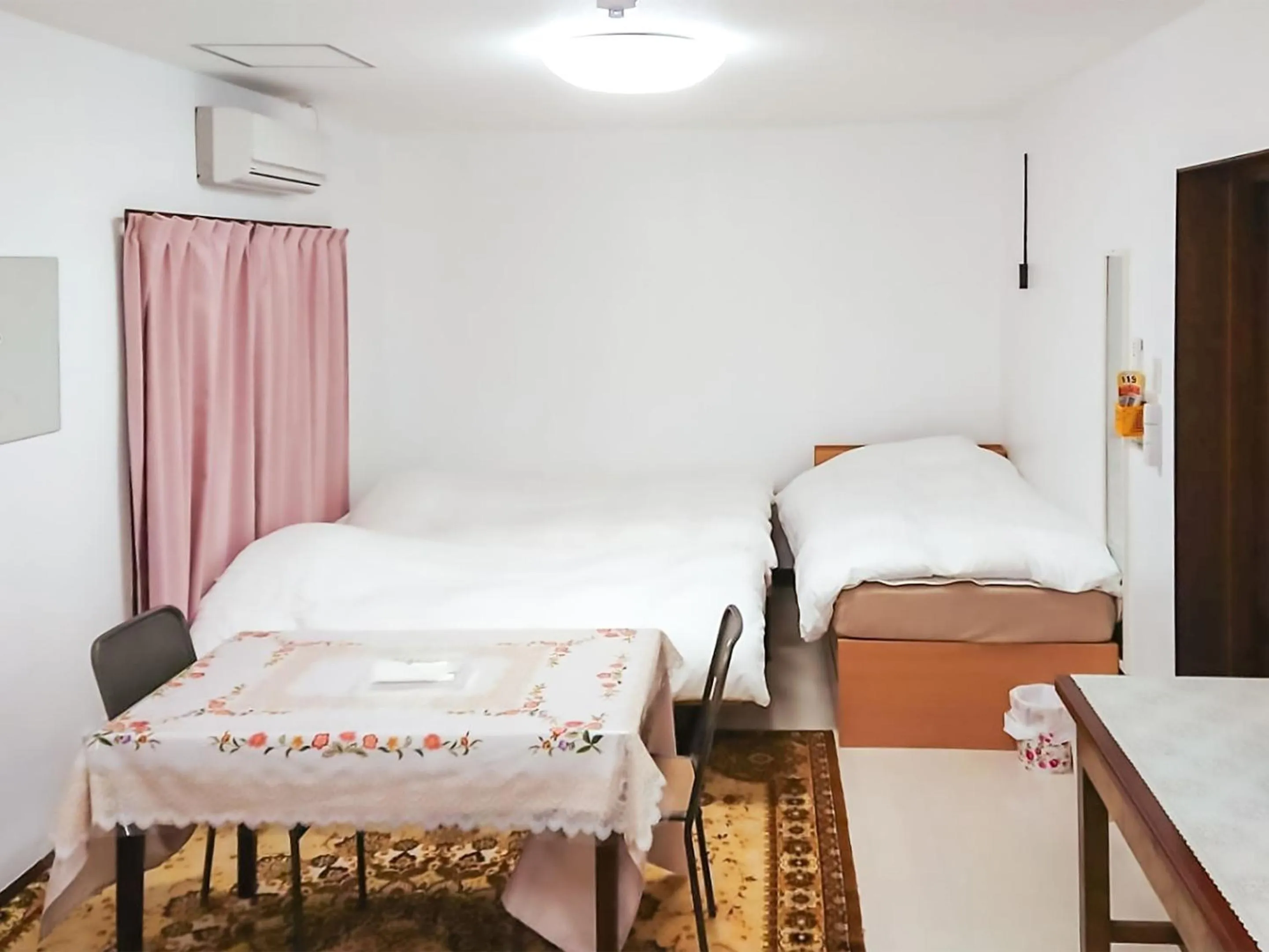 Bed in Oyama Guesthouse Kyoto