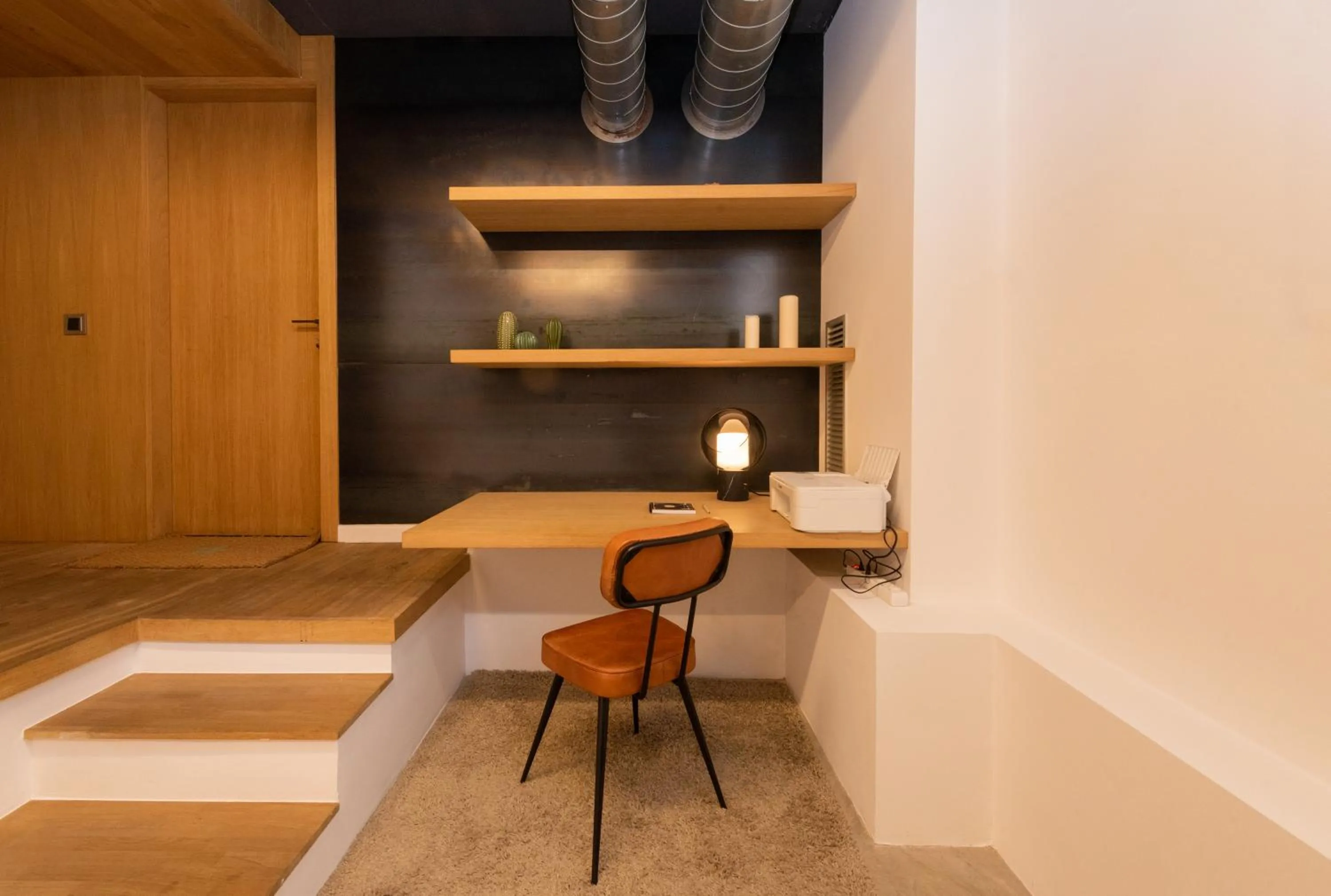 Seating area in Petit Luxe Loft