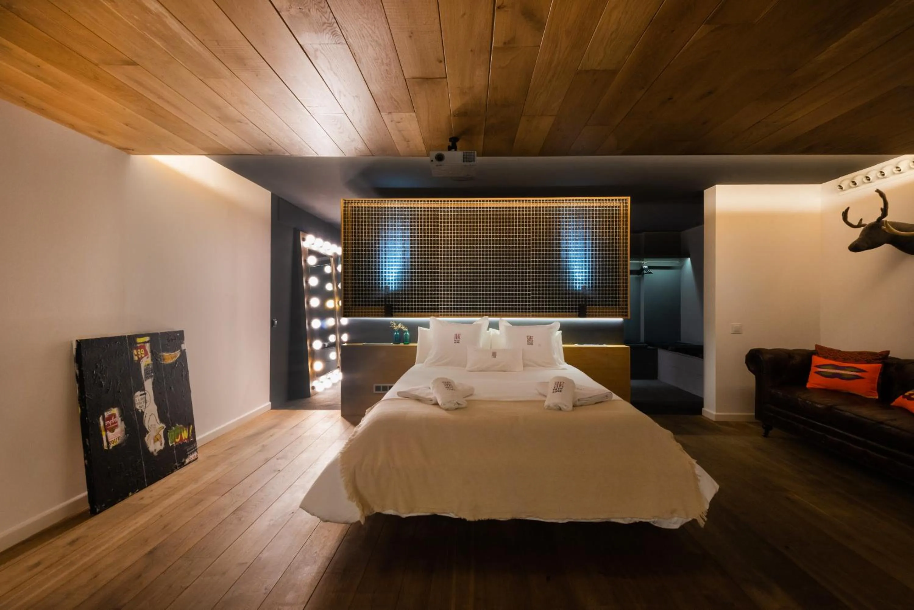 Bed in Petit Luxe Loft