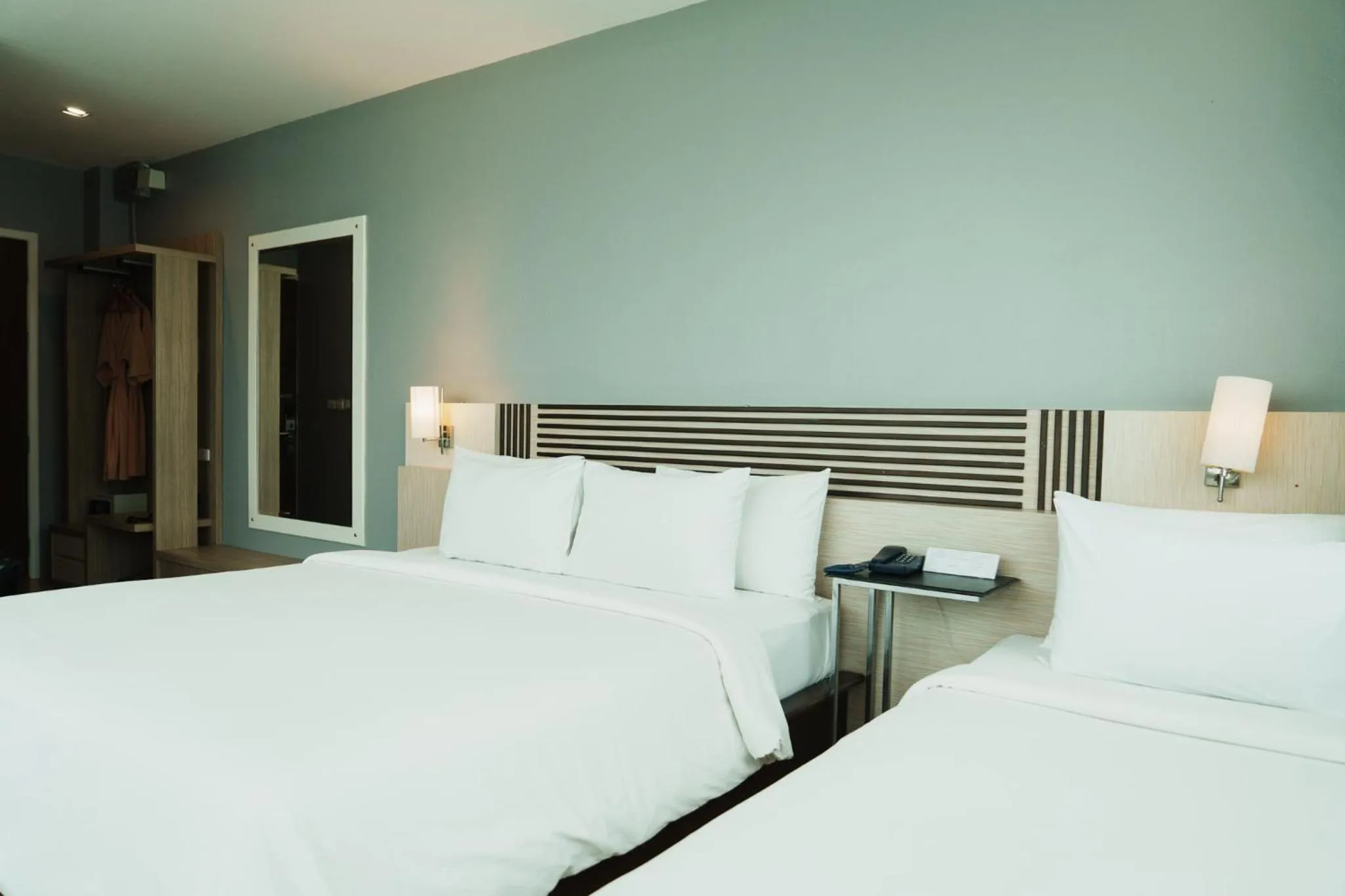 Bed in Green Hotel and Resort