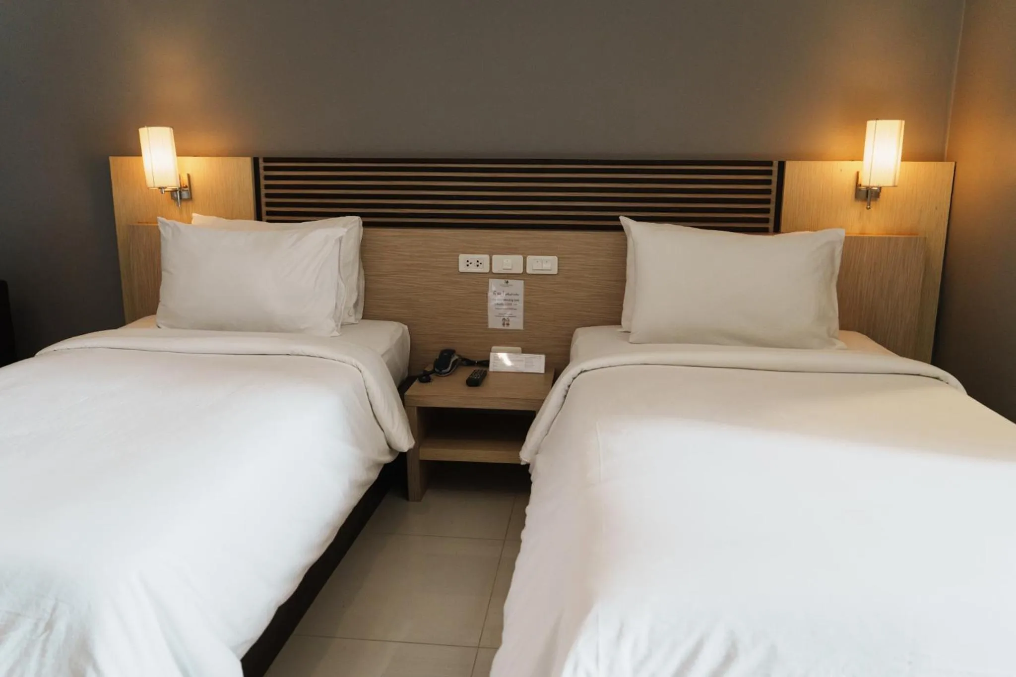 Bed in Green Hotel and Resort