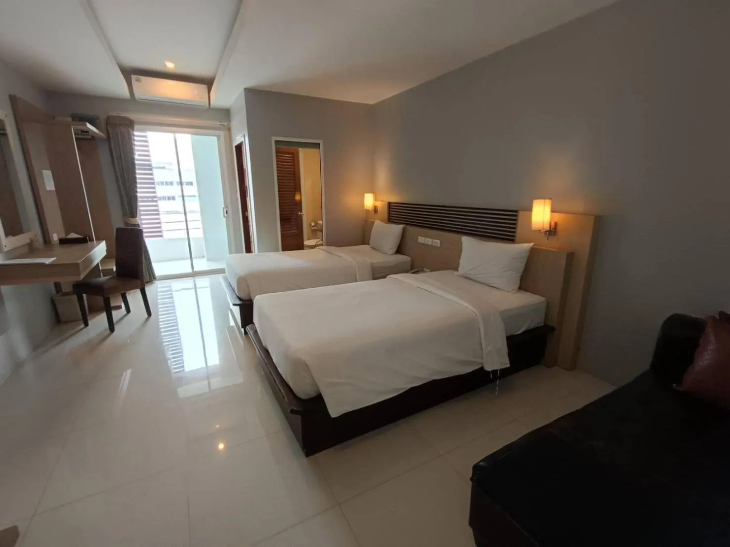 Bed in Green Hotel and Resort