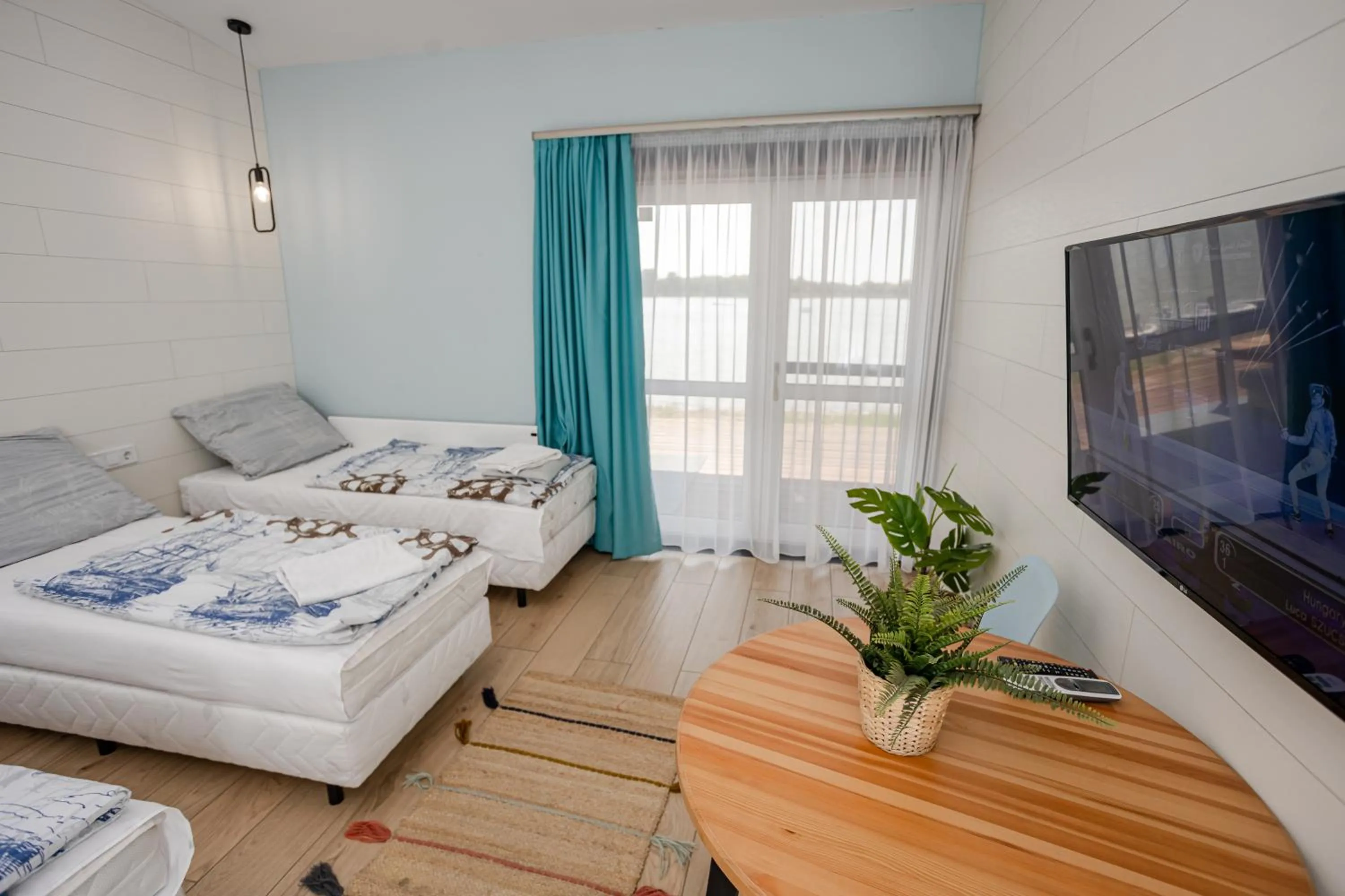 Photo of the whole room, Bed in Halfarock Vízi-Erdei Apartmanház