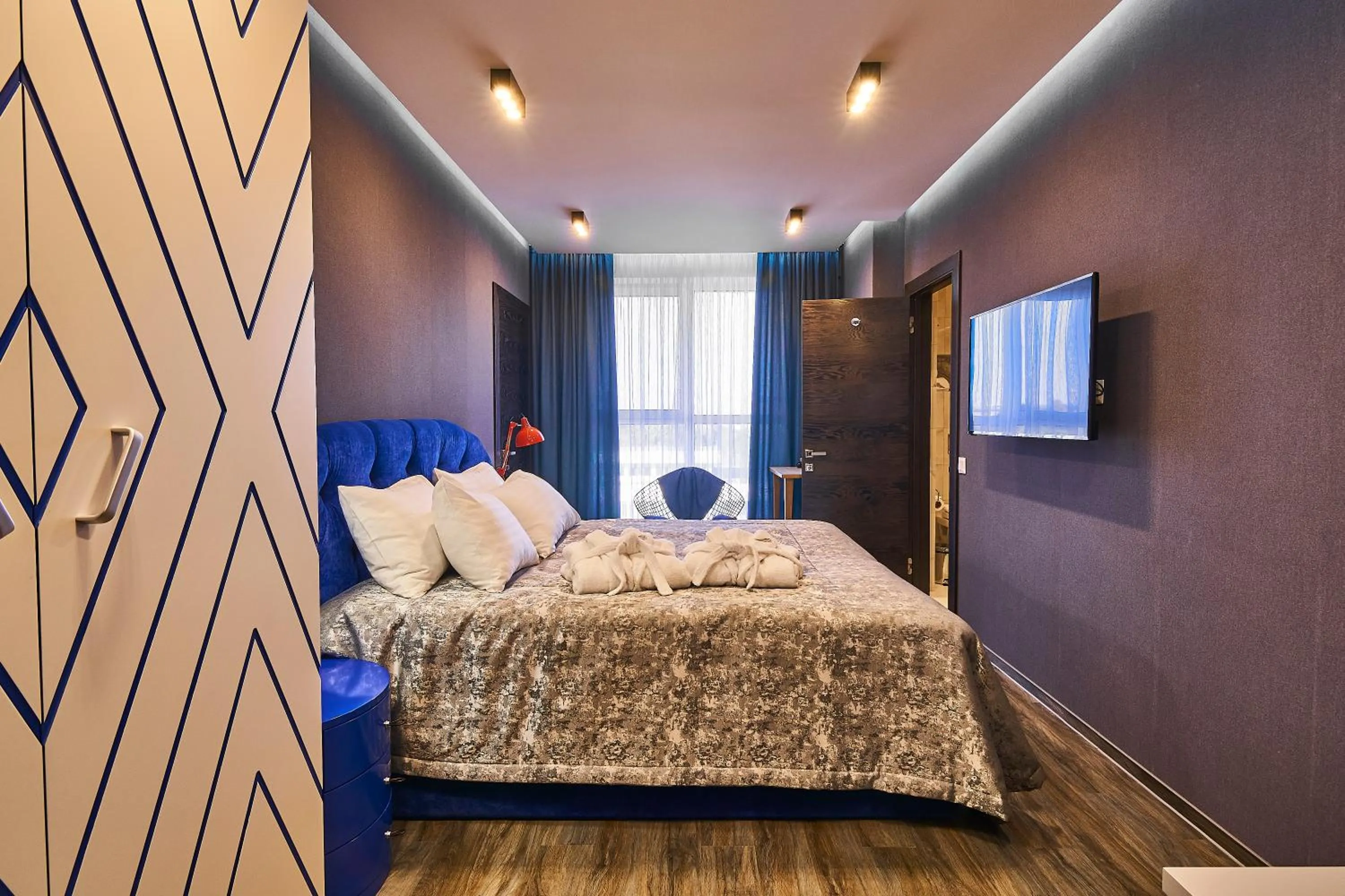 Photo of the whole room, Bed in Light Hotel