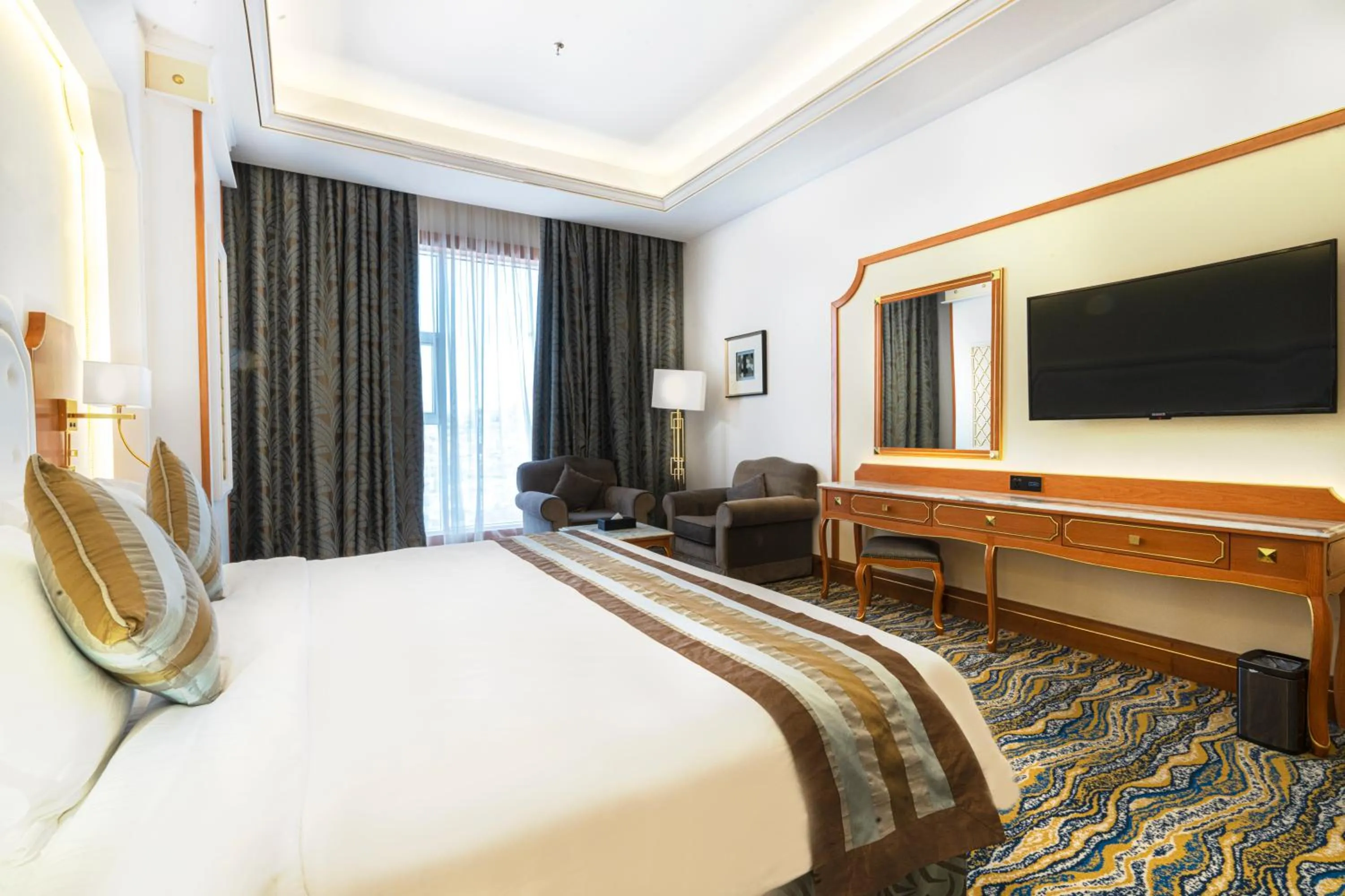 Bed in Iridium Hotel