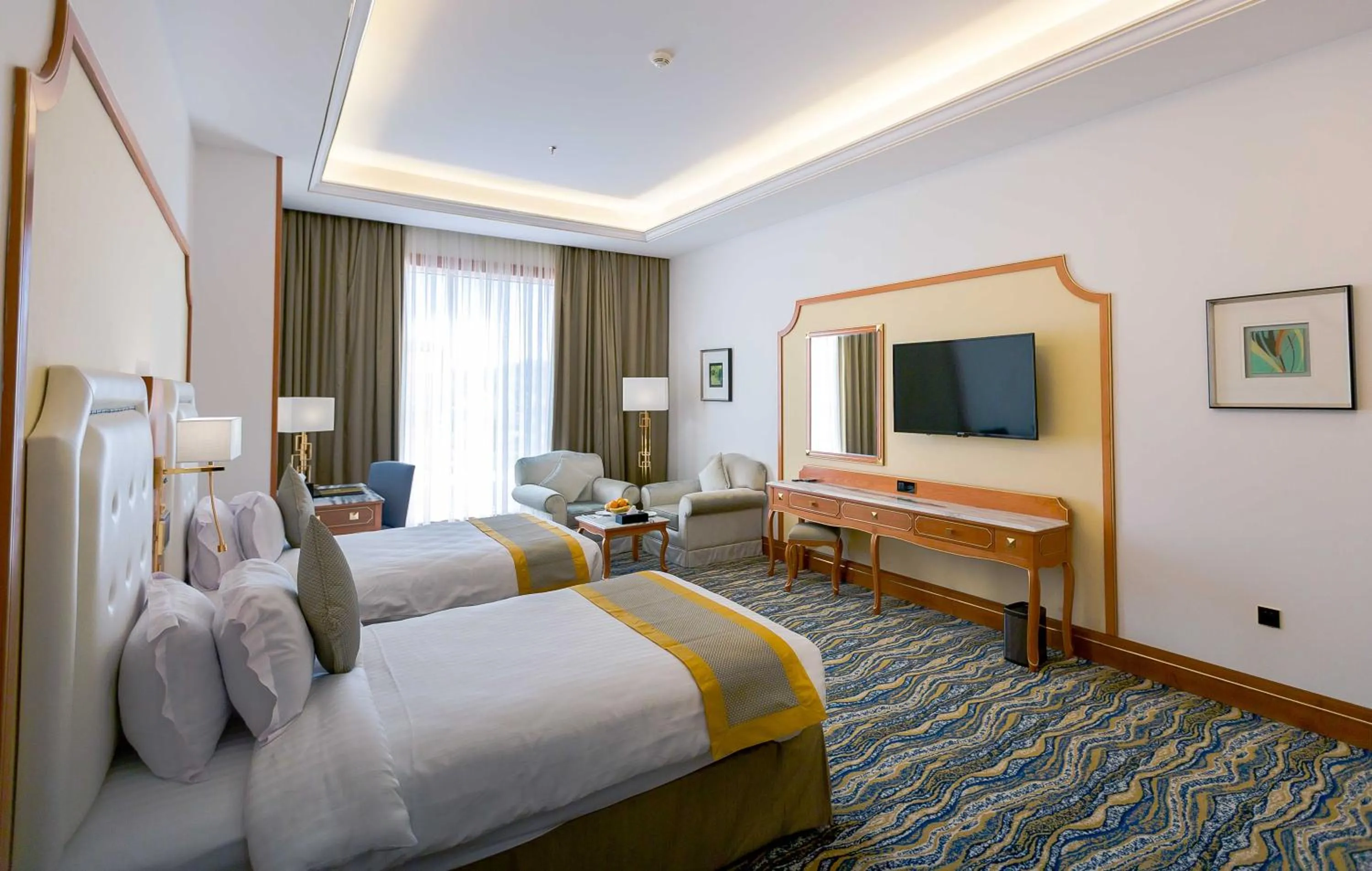 Bed in Iridium Hotel