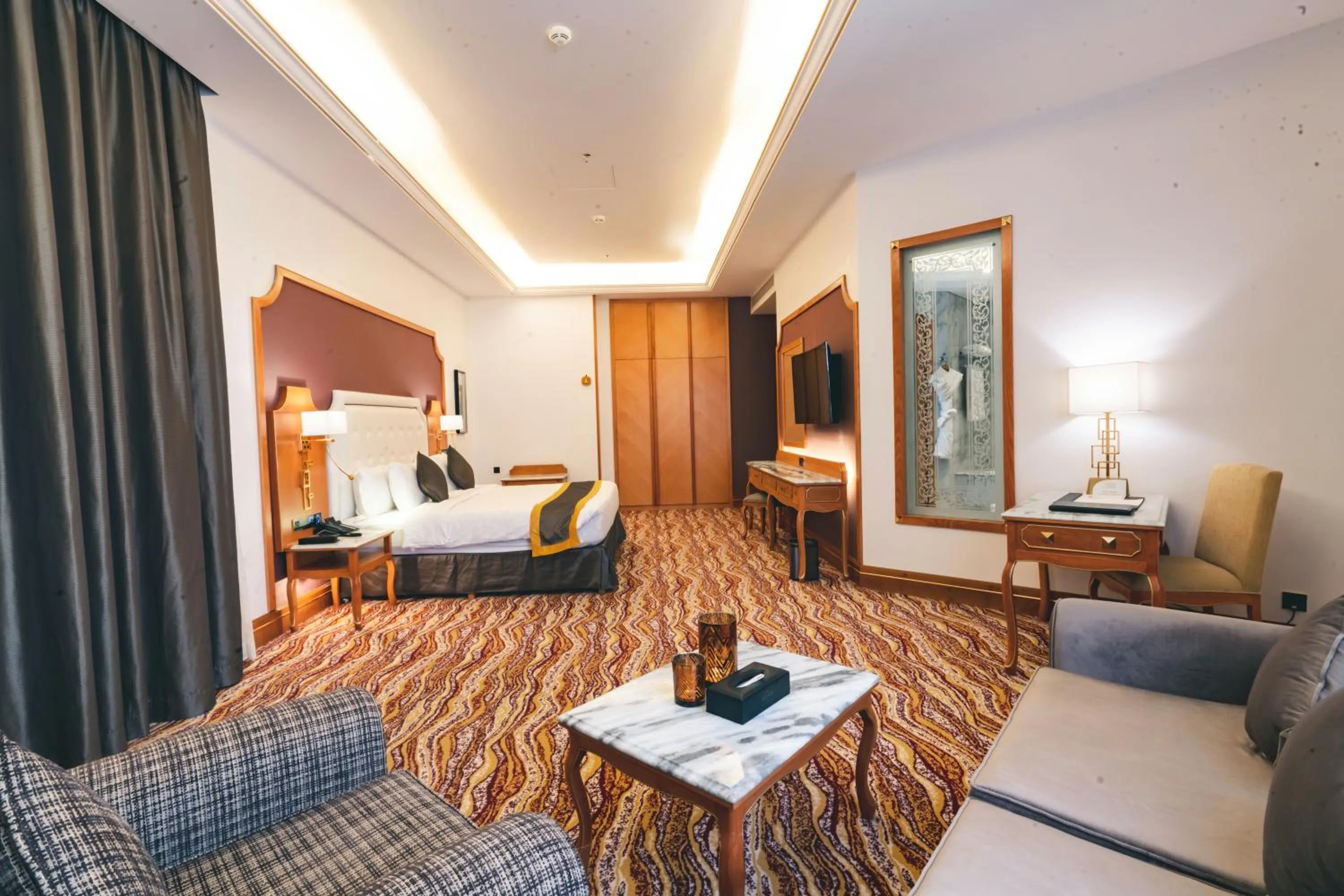 Bed in Iridium Hotel