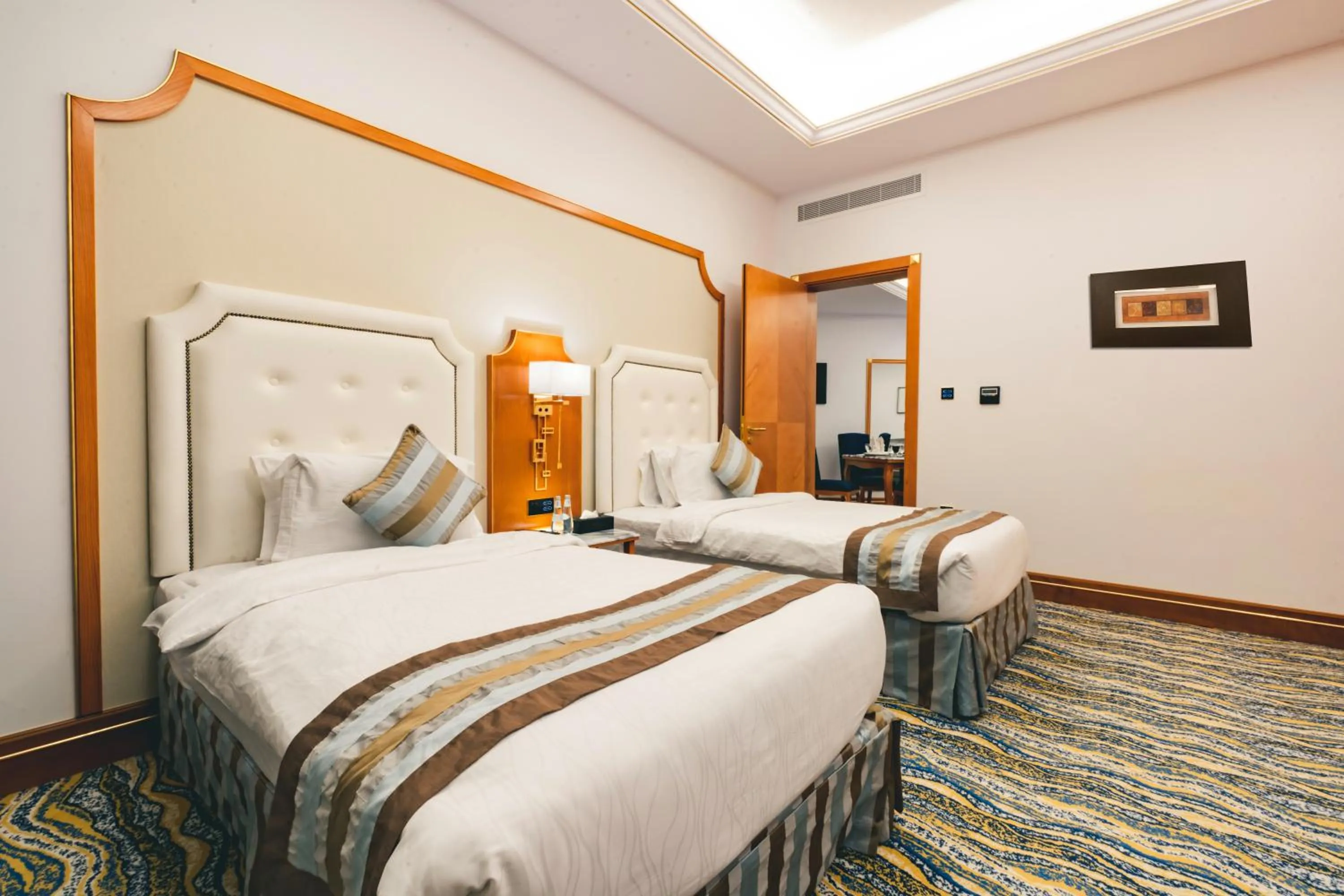 Bed in Iridium Hotel