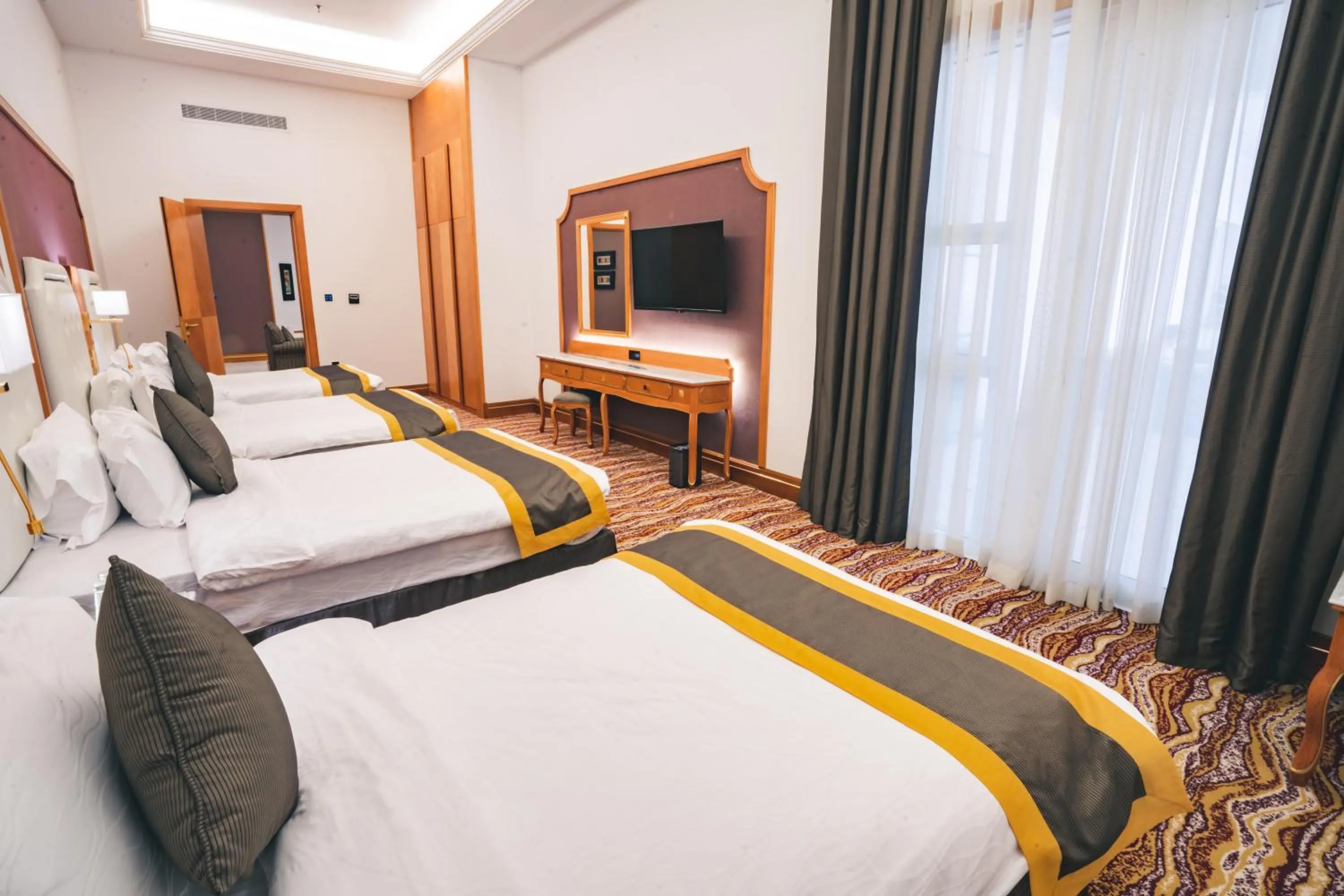 Bed in Iridium Hotel